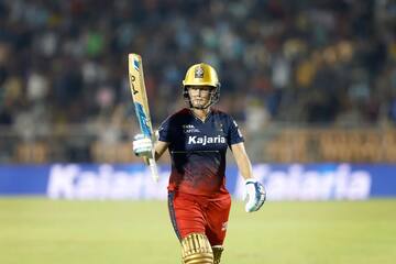 Devine Blasts 36-ball 99 as RCB Surge to Huge Win Over Giants