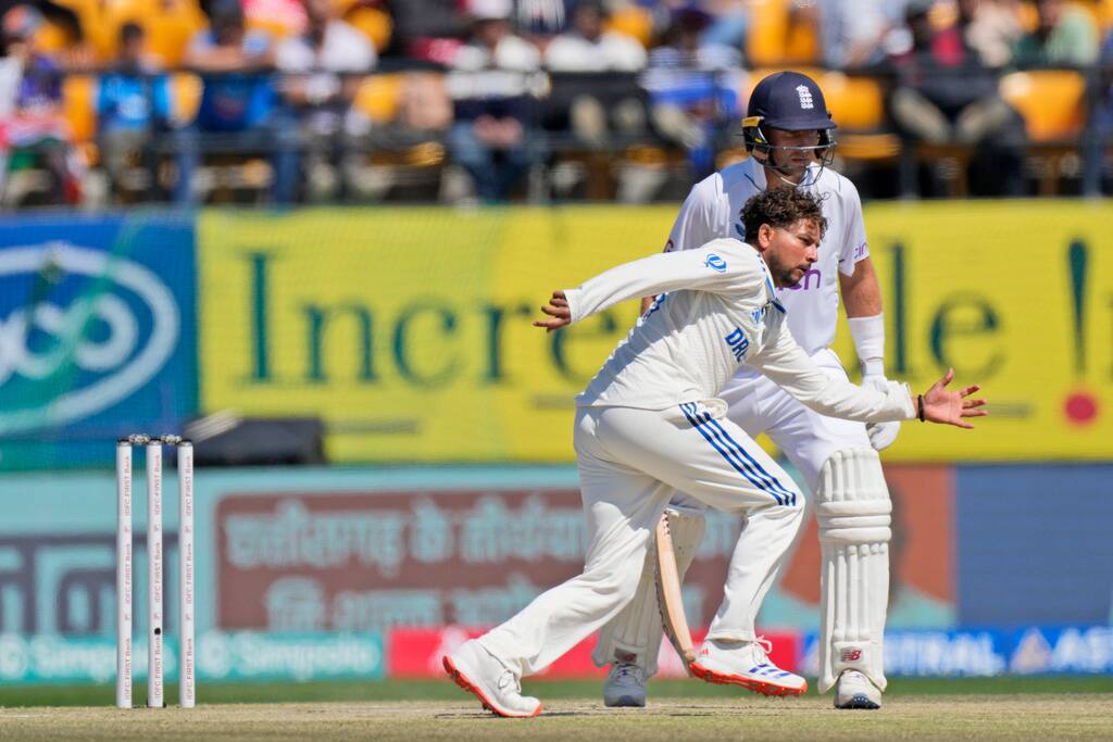 Kuldeep Yadav saving the ball off his own bowling (AP Photo)