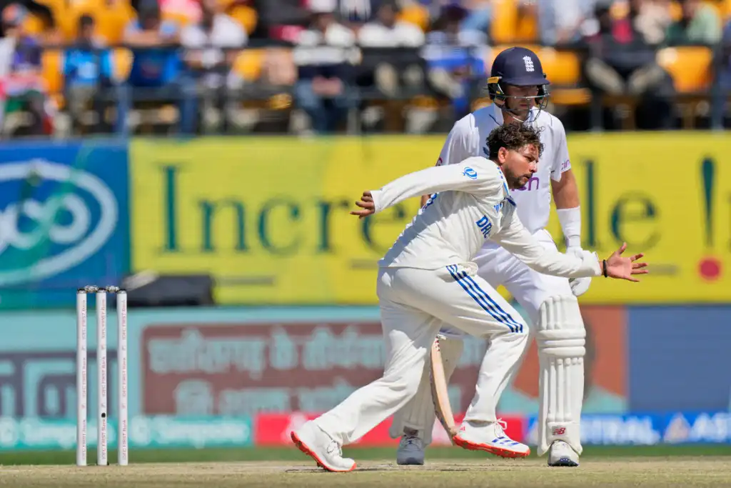 Kuldeep Yadav saving the ball off his own bowling (AP Photo)