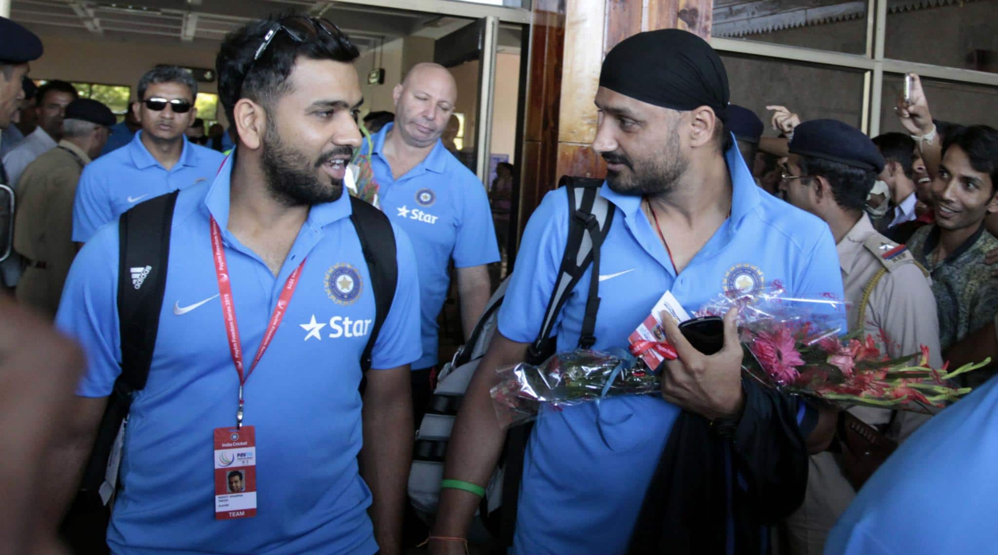 Rohit Sharma and Harbhajan Singh coming out of airport with Indian team (old image, X.com)