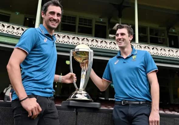 Starc and Cummins with the World Cup Trophy (X.com)