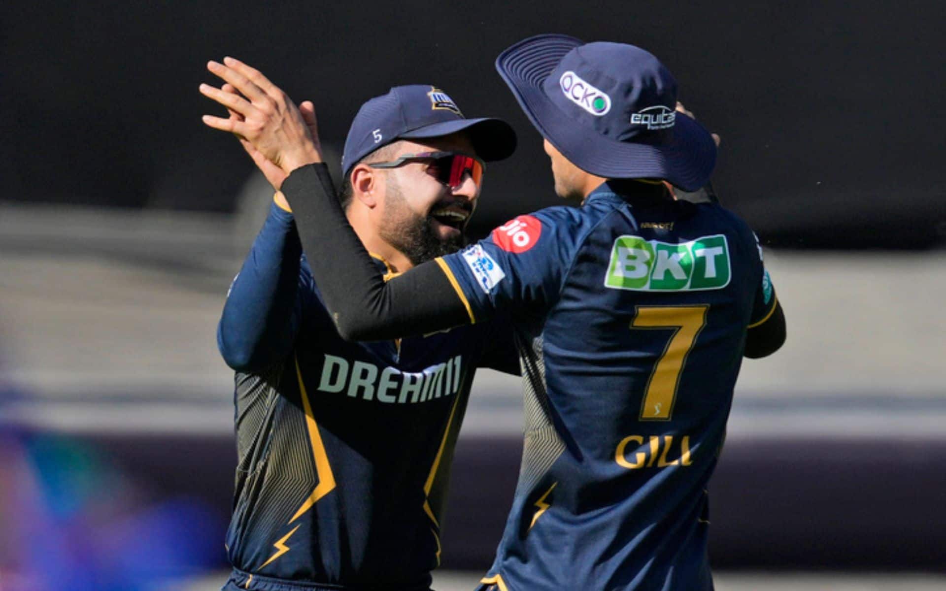 Rashid Khan celebrating the catch with Gill (AP)