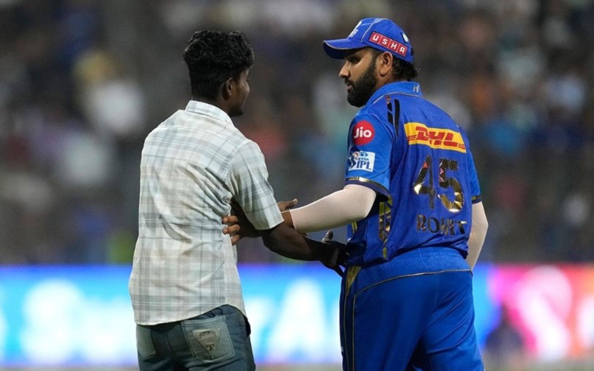 A fan ran the entire field to hug his hero Rohit Sharma (Twitter)