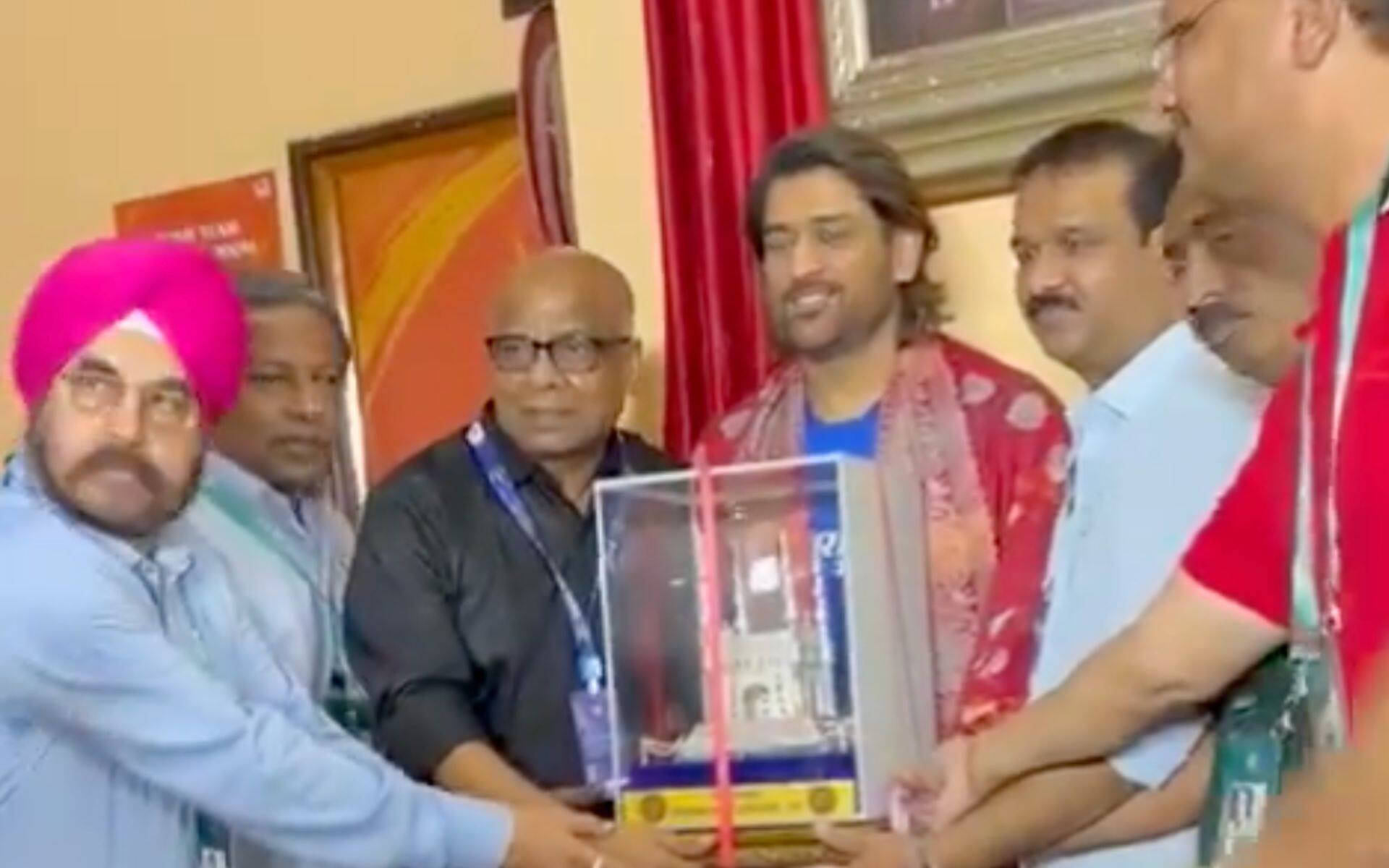 MS Dhoni being felicitated by Hyderabad Cricket Association