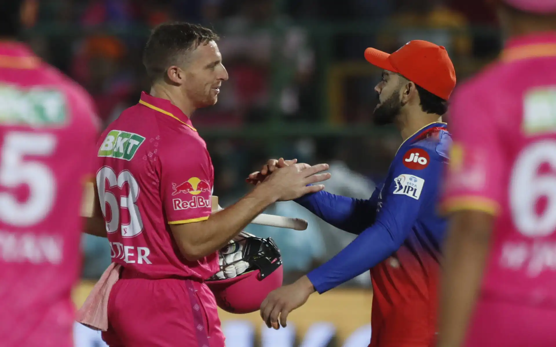Jos Buttler with Virat Kohli (Source: AP Photo)