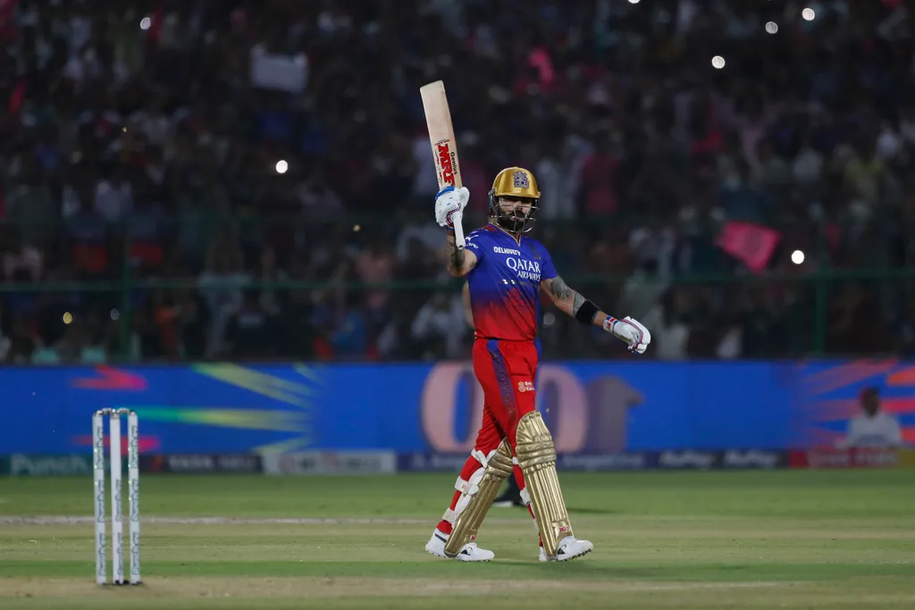 Virat Kohli celebrating his century in style (AP)
