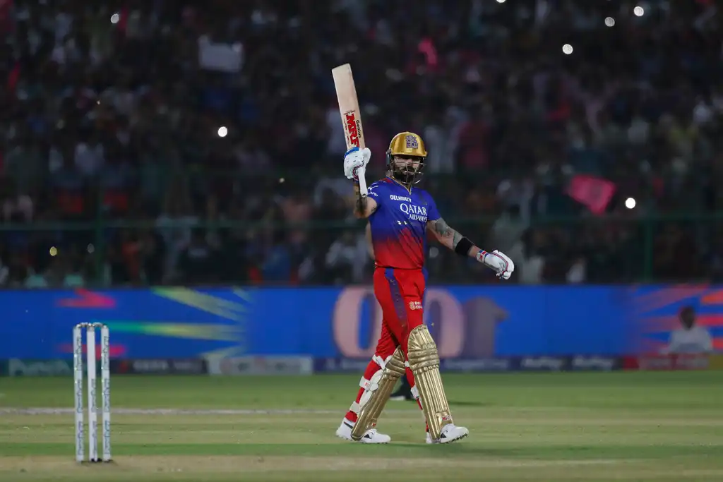Virat Kohli celebrating his century in style (AP)
