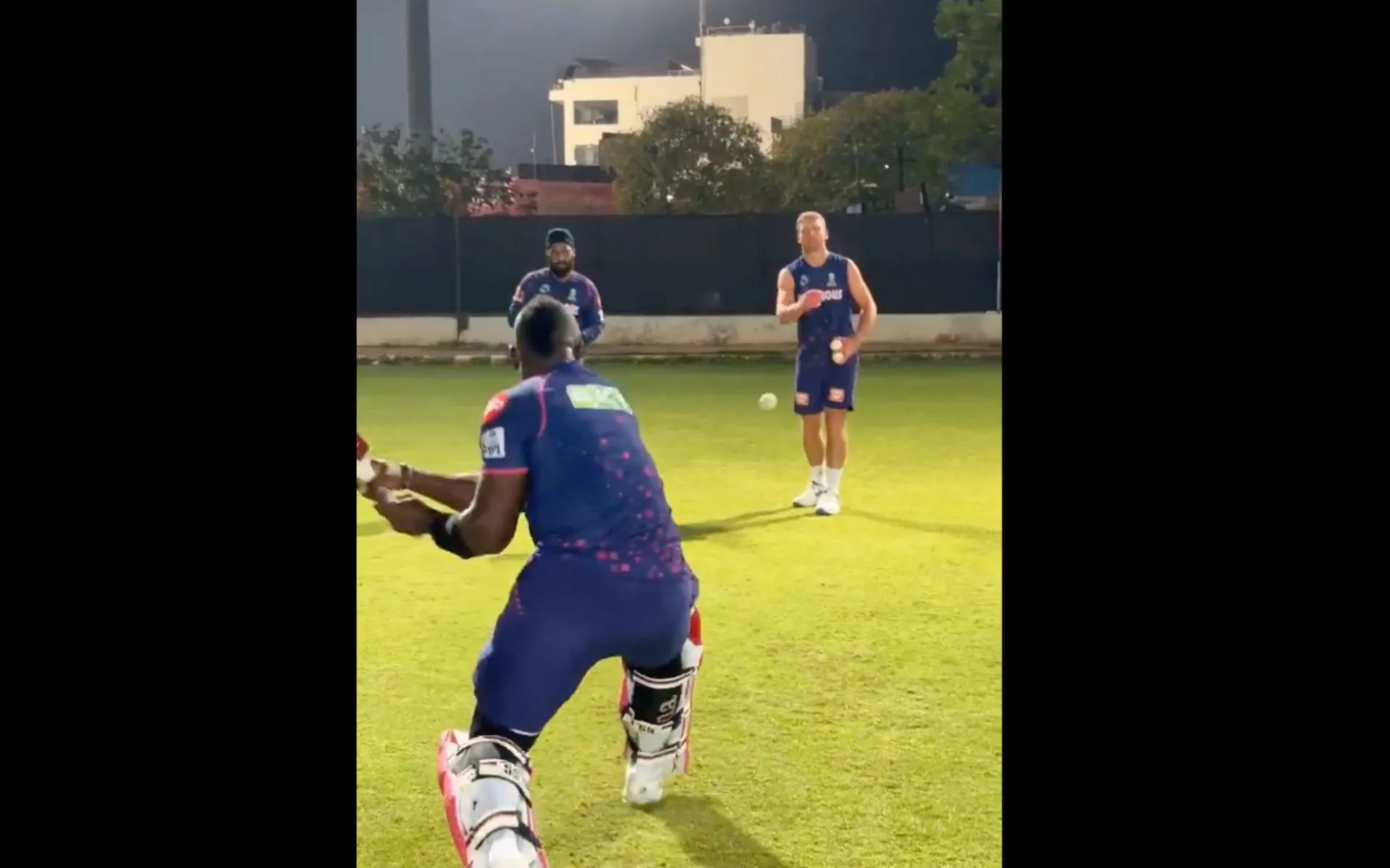 Jos Buttler training Rovman Powell (X.com)