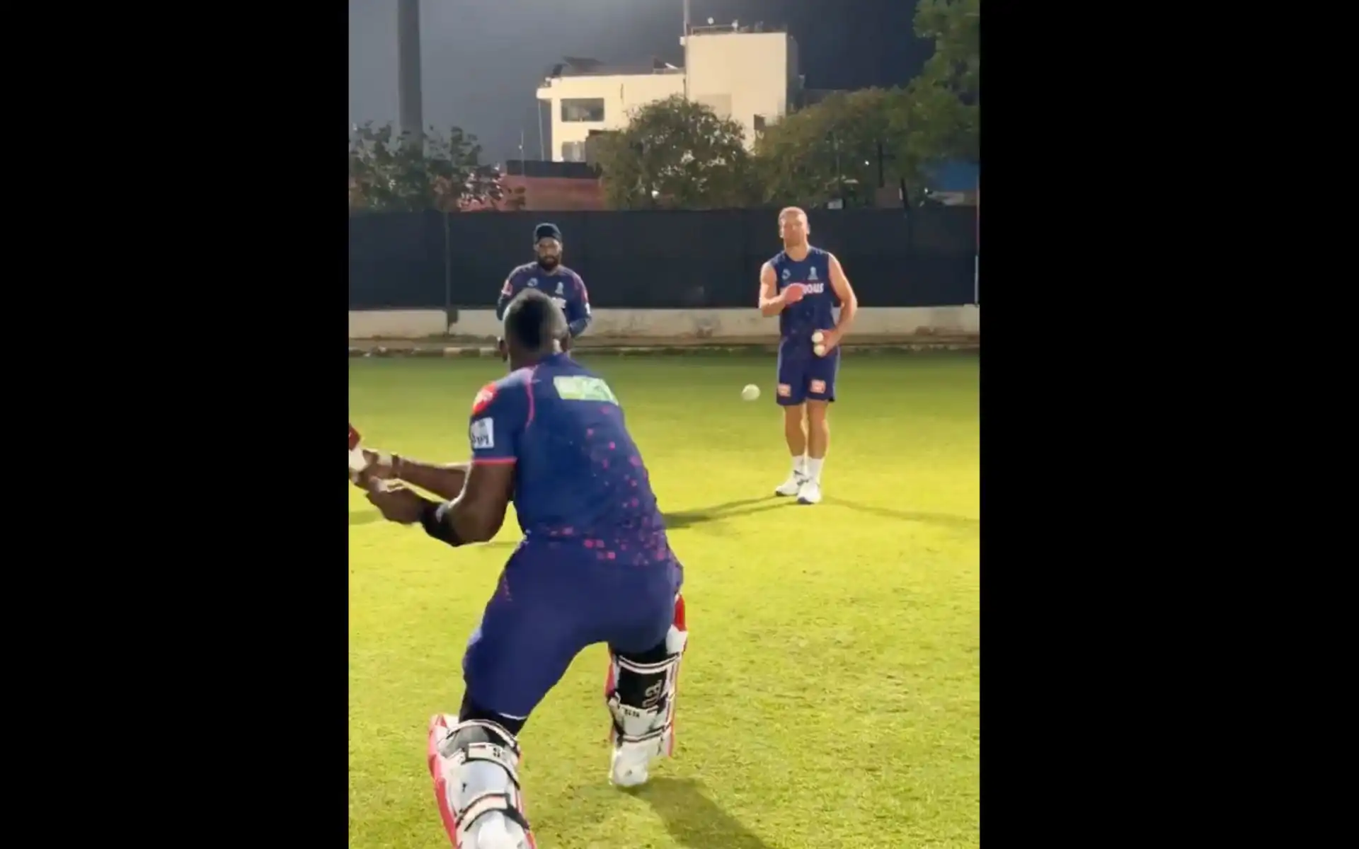 Jos Buttler training Rovman Powell (X.com)