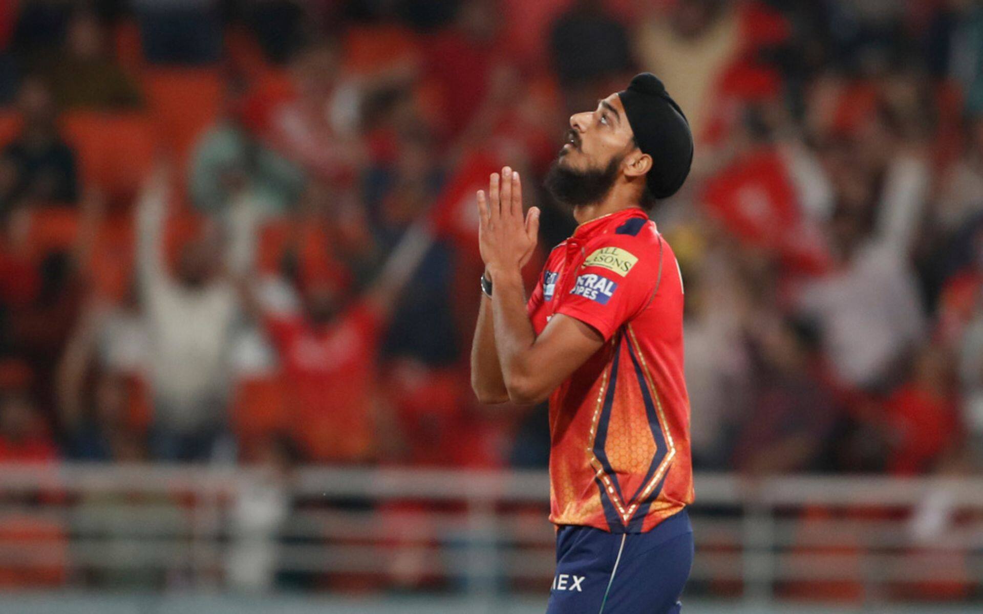 Arshdeep thanking god after Riyan Parag's wicket (AP Photo)