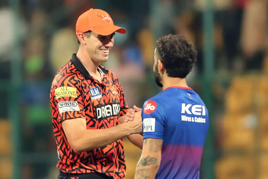 Cummins & Kohli having a moment after RCB vs SRH (AP)
