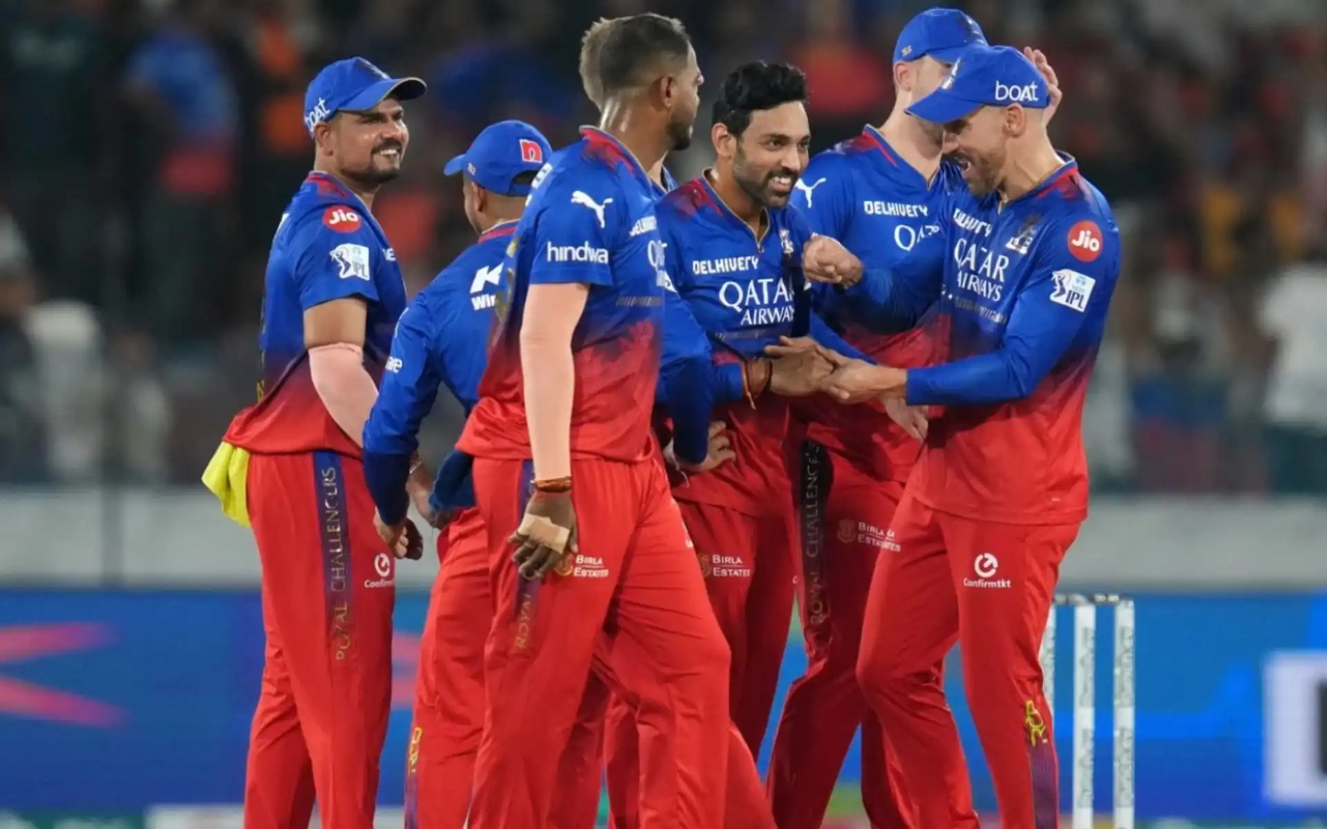 Faf du Plessis celebrating a wicket with RCB teammates (BCCI)