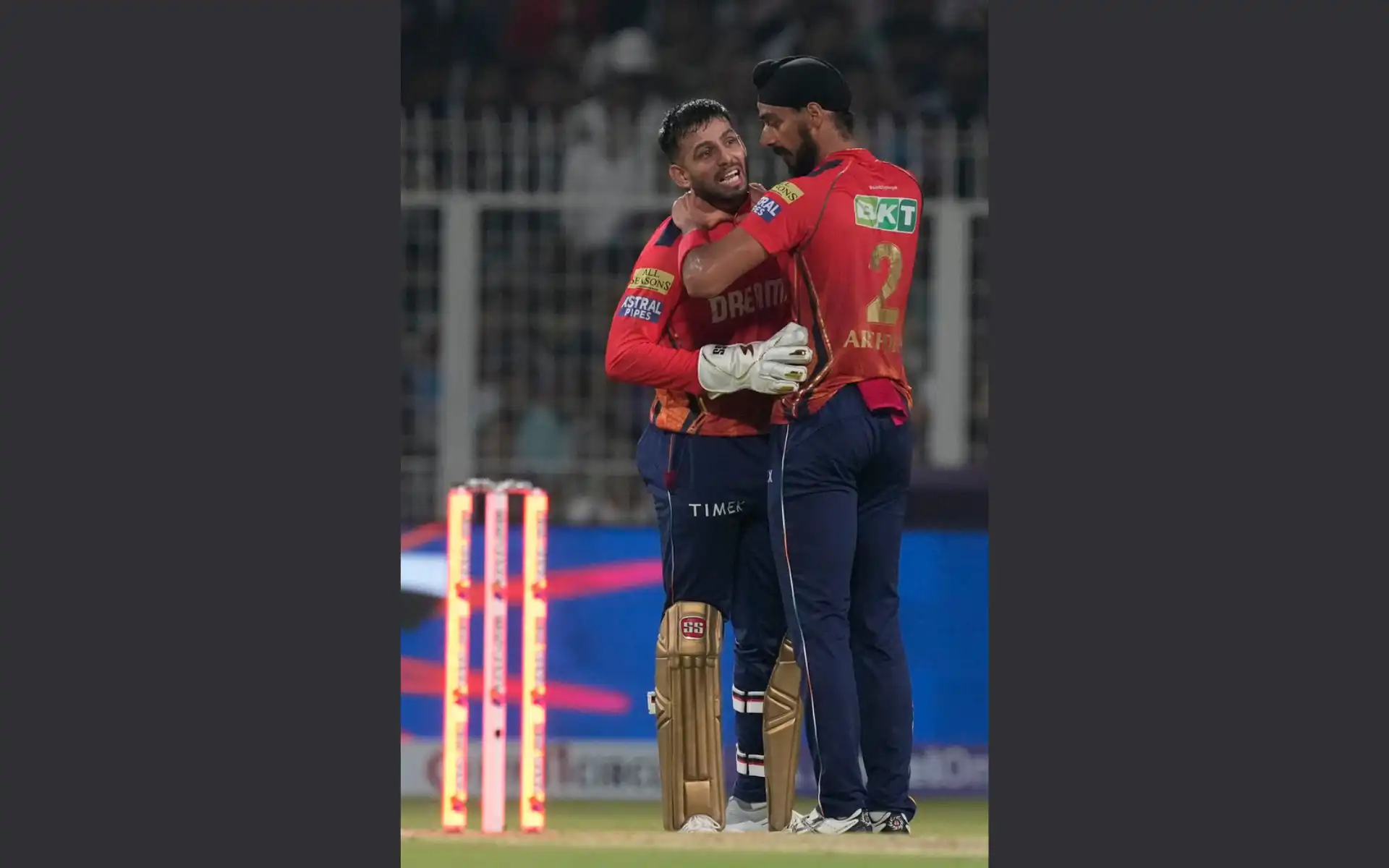 Arshdeep Singh with Jitesh Sharma after Russell's wicket (AP)