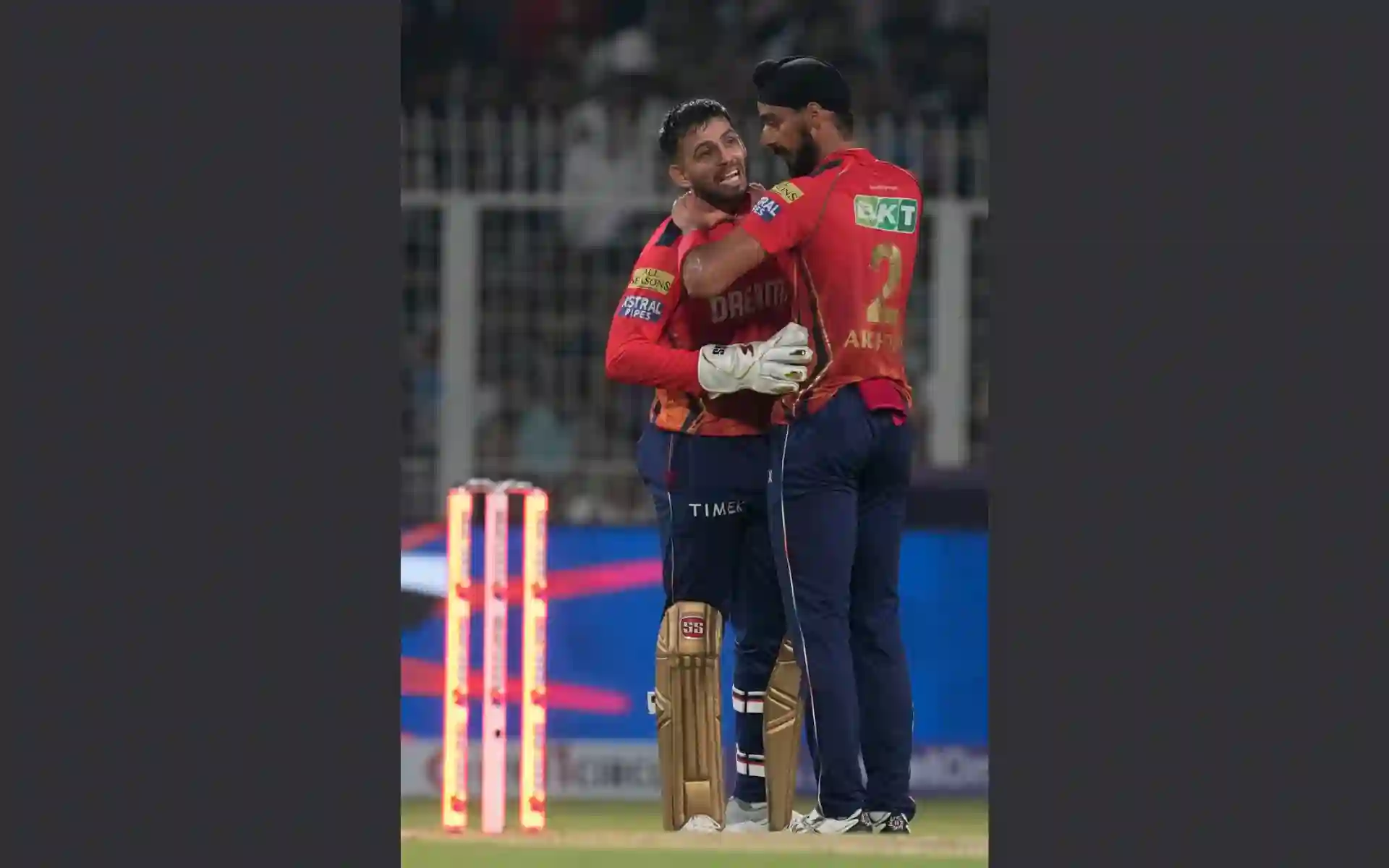 Arshdeep Singh with Jitesh Sharma after Russell's wicket (AP)