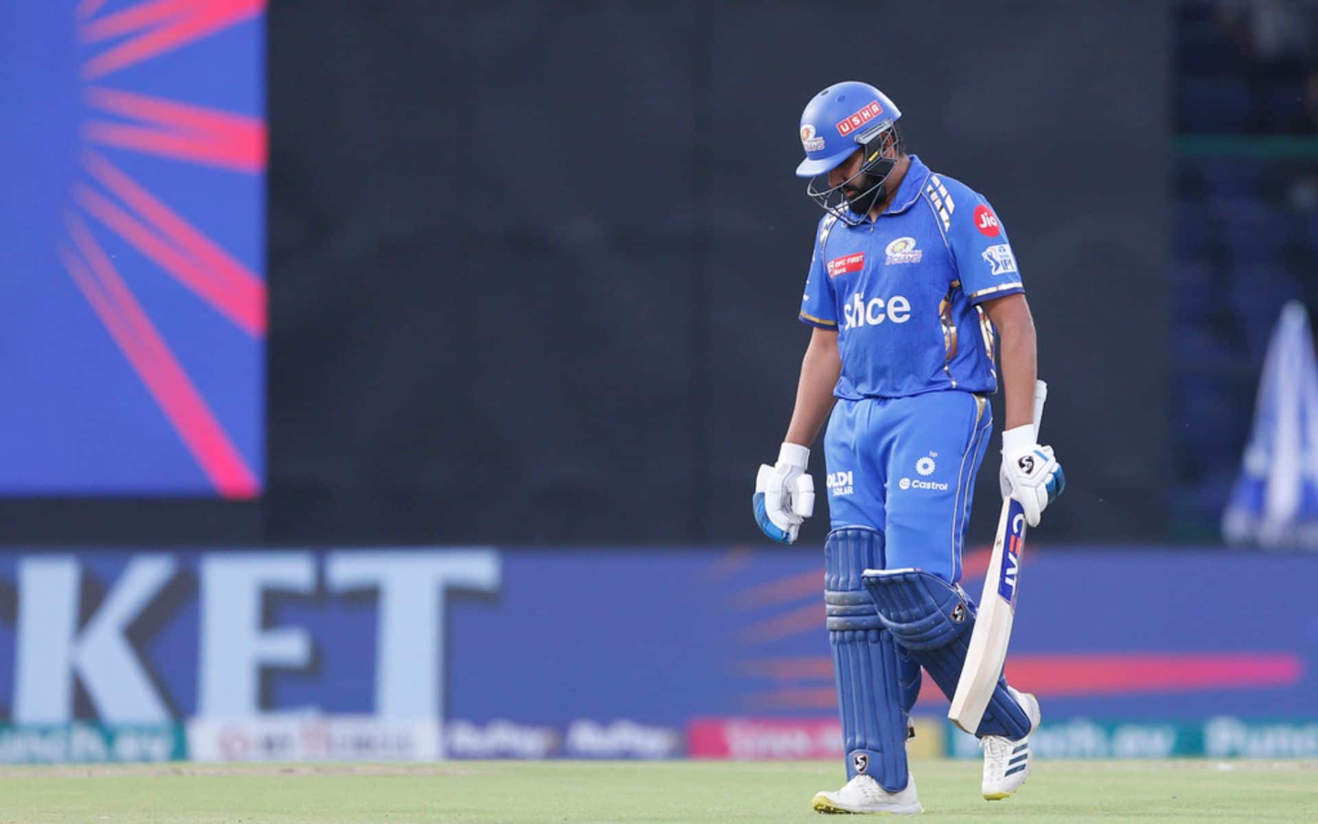 Rohit Sharma walking off after losing his wicket (AP)