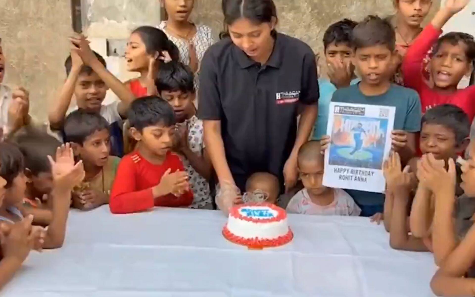 Rohit Sharma fans cutting cake on star batter's 37th birthday (x.com)
