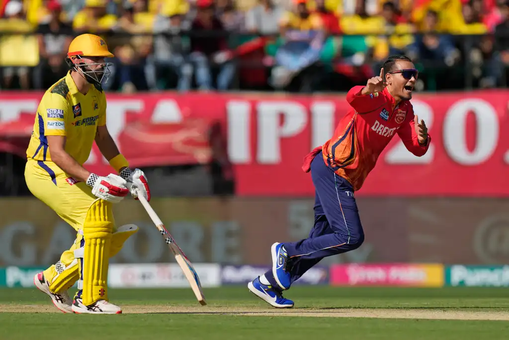 Rahul Chahar celebrating the wicket of Ruturaj Gaikwad (AP Photo)
