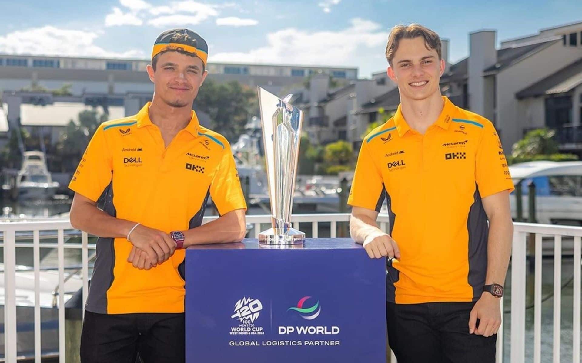 Lando Norris and Oscar Piastri with the T20 World Cup 2024 trophy at Miami Grand Prix (x.com)