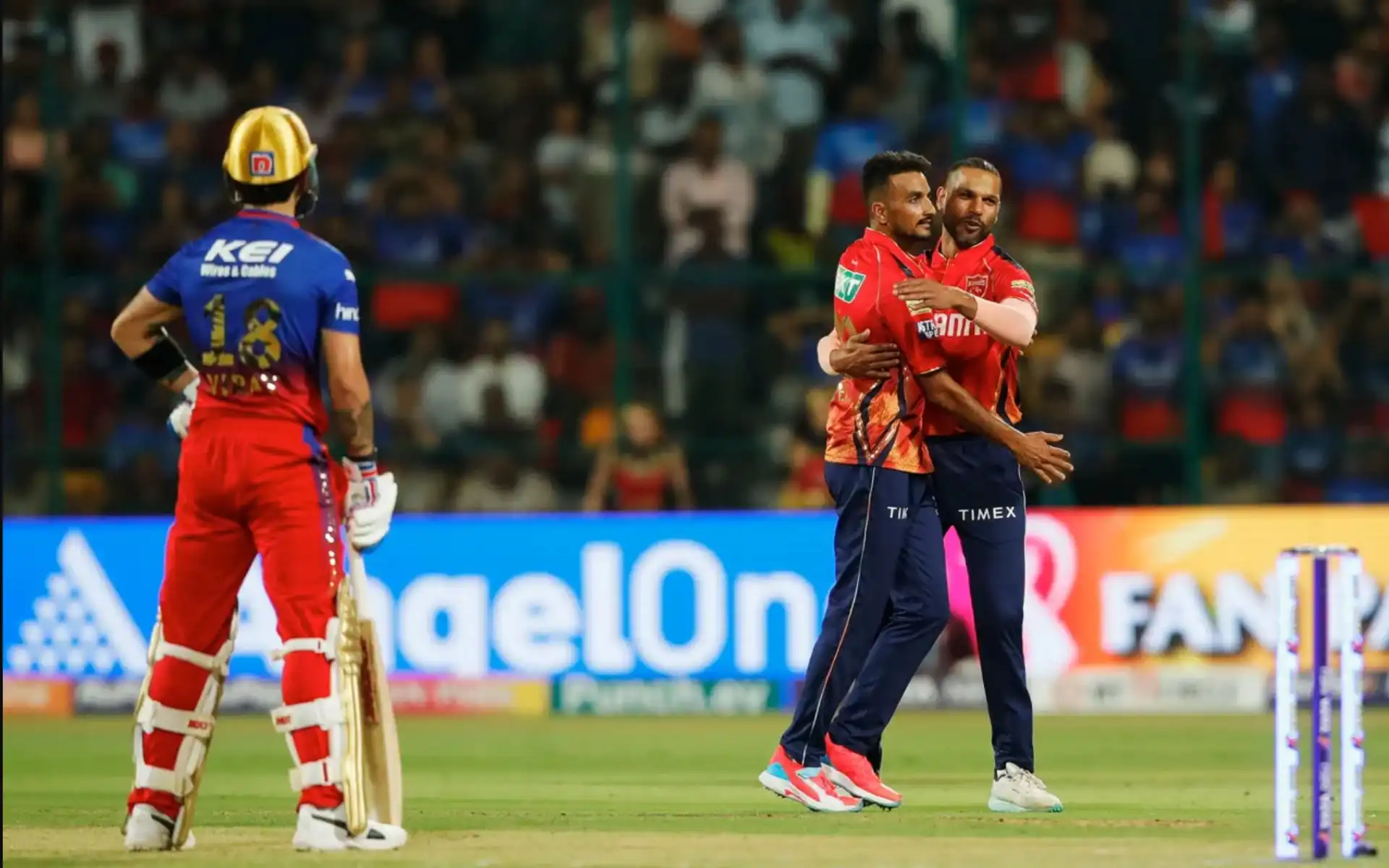 Virat Kohli looking at Harshal, Dhawan (BCCI)