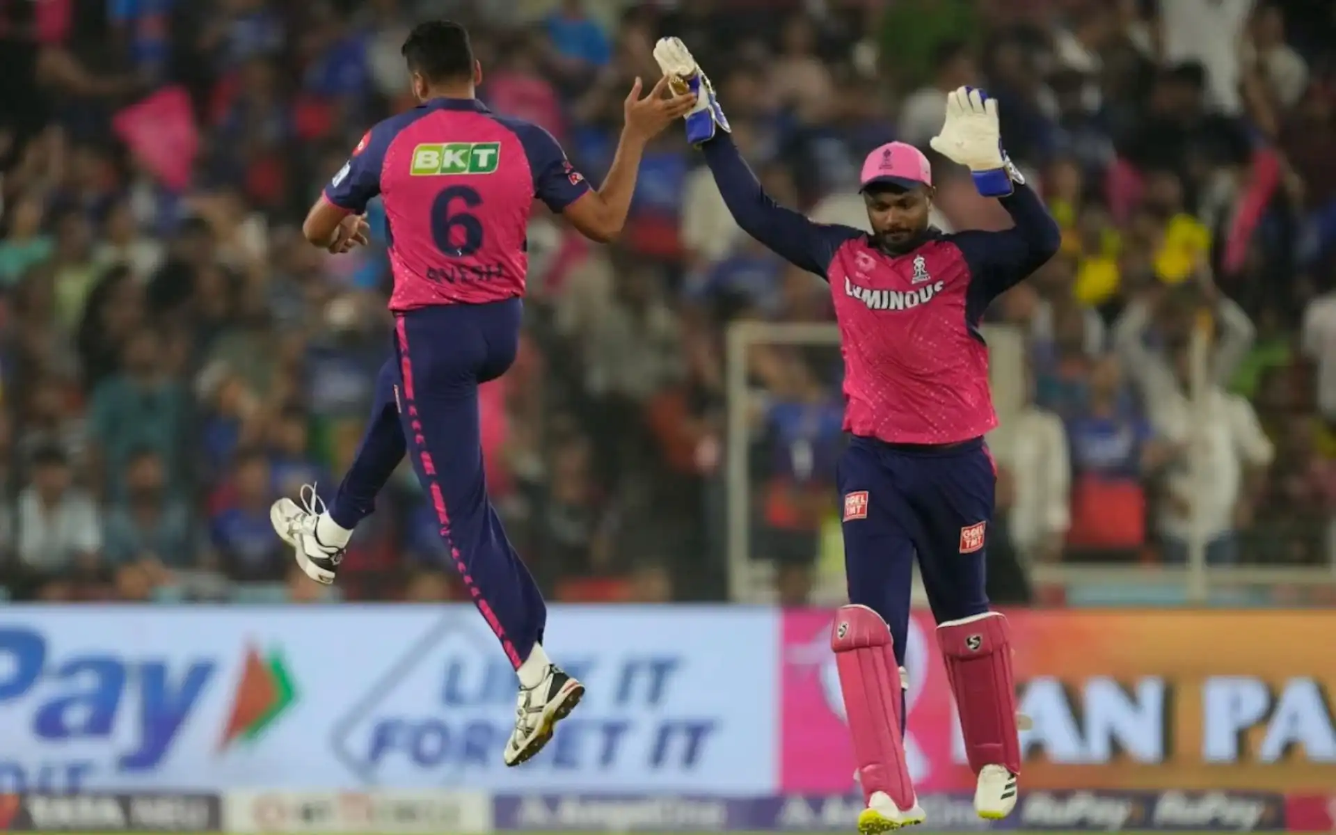 Sanju Samson celebrating a wicket with Avesh Khan (AP)