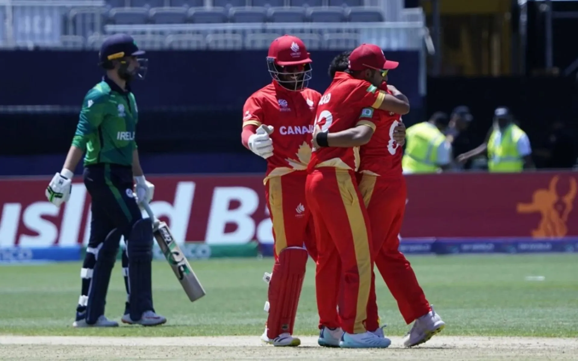 Canada players celebrating an Ireland wicket (x.com)