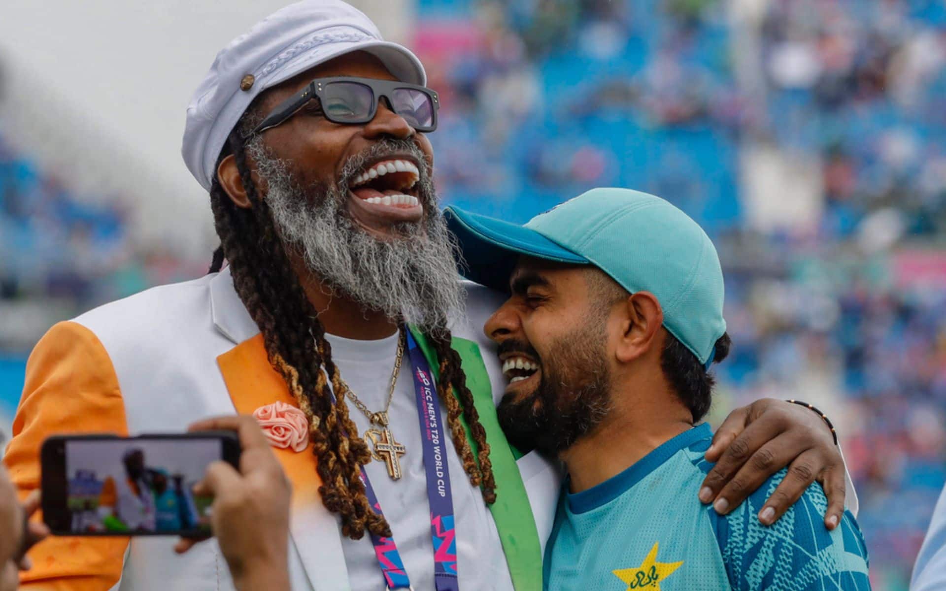 Gayle with Pakistan captain ahead of India clash (AP Photo)