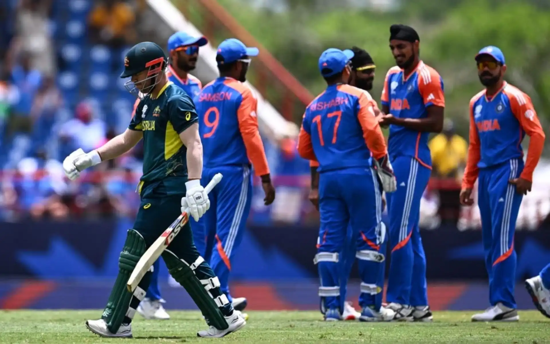 Indian players celebrating an Australian wicket (x.com)