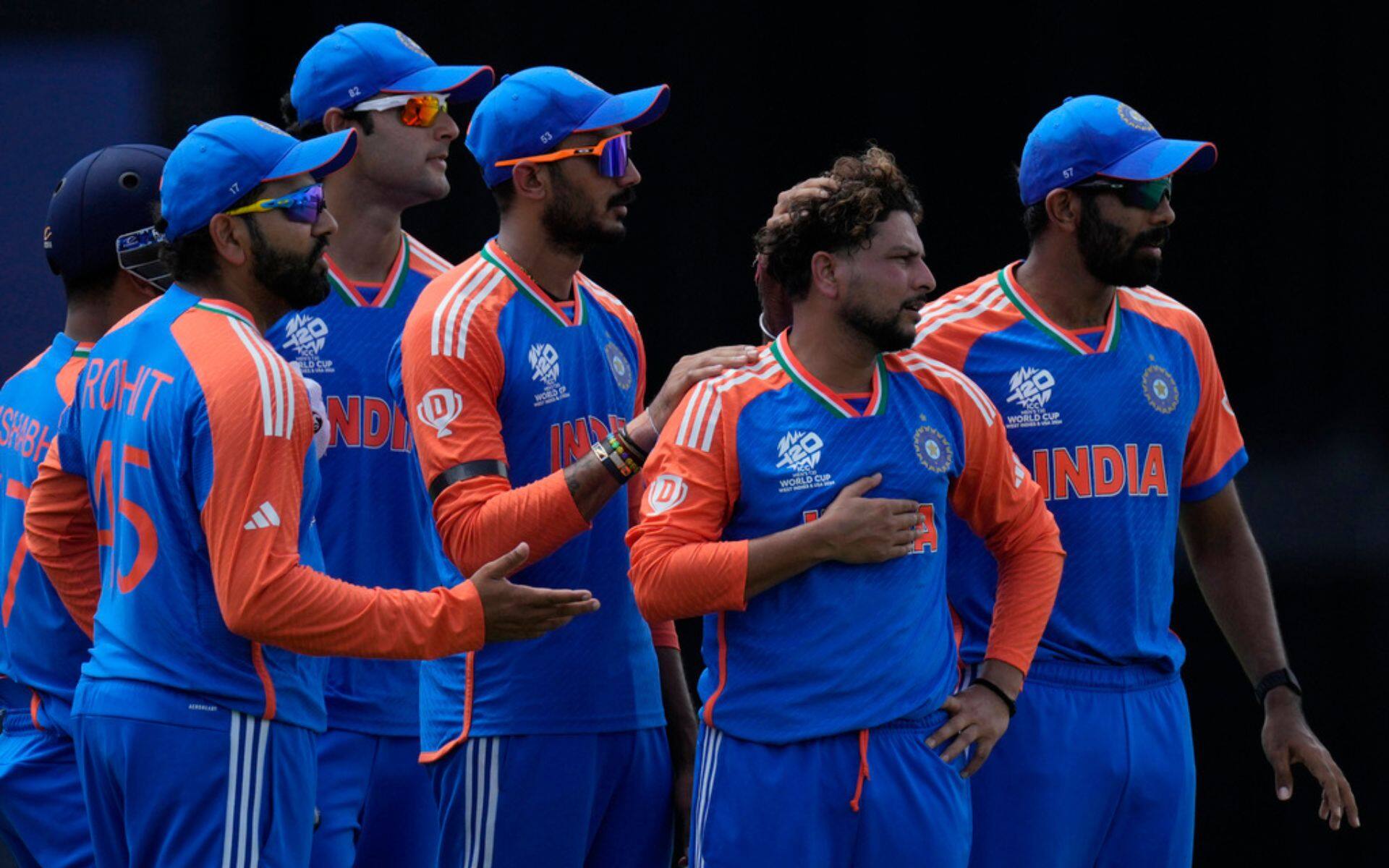 Kuldeep with Rohit, Bumrah and other teammates (AP Photo)