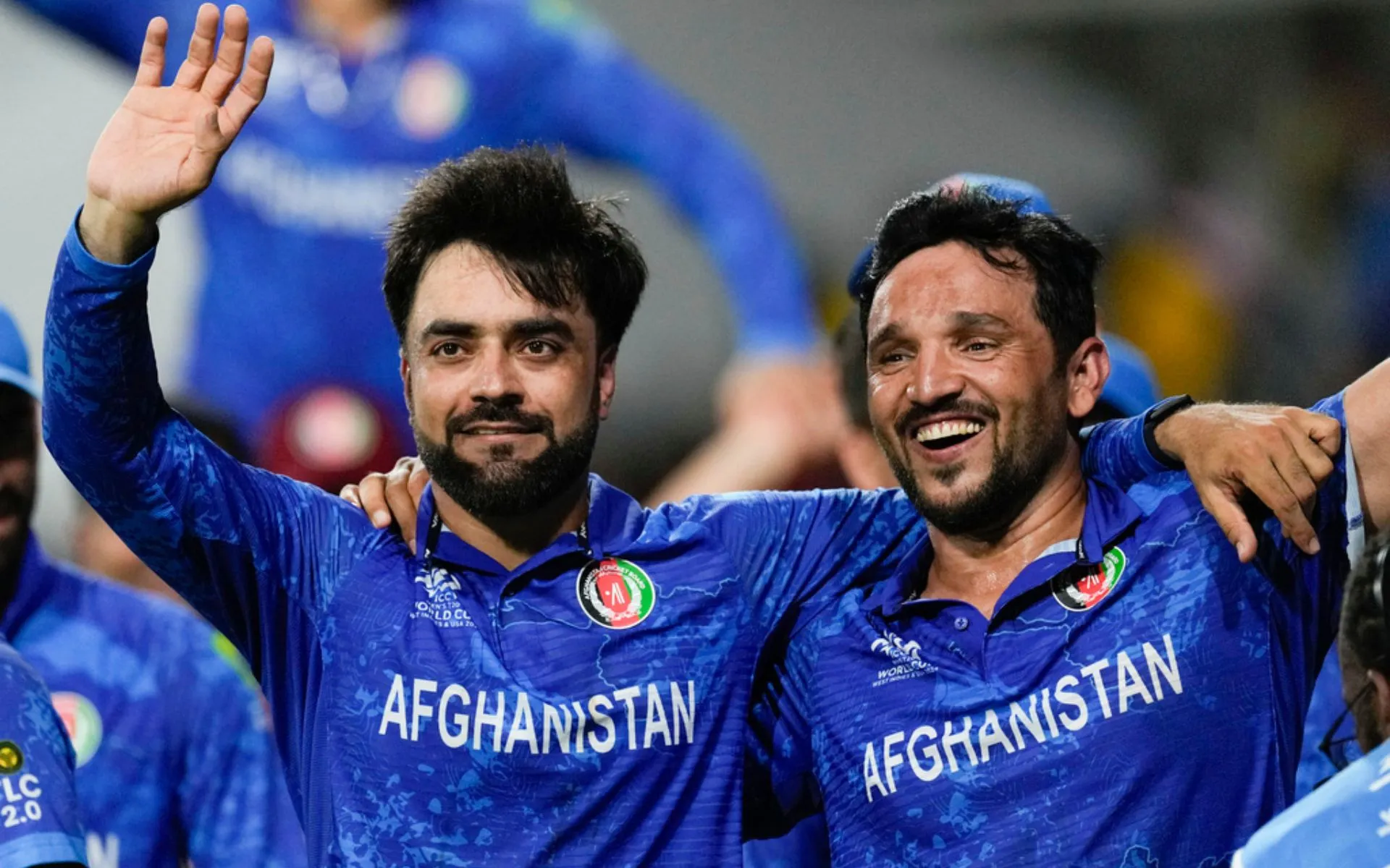 Rashid Khan and Gulbadin Naib celebrating AFG's SF qualification (AP Photo)
