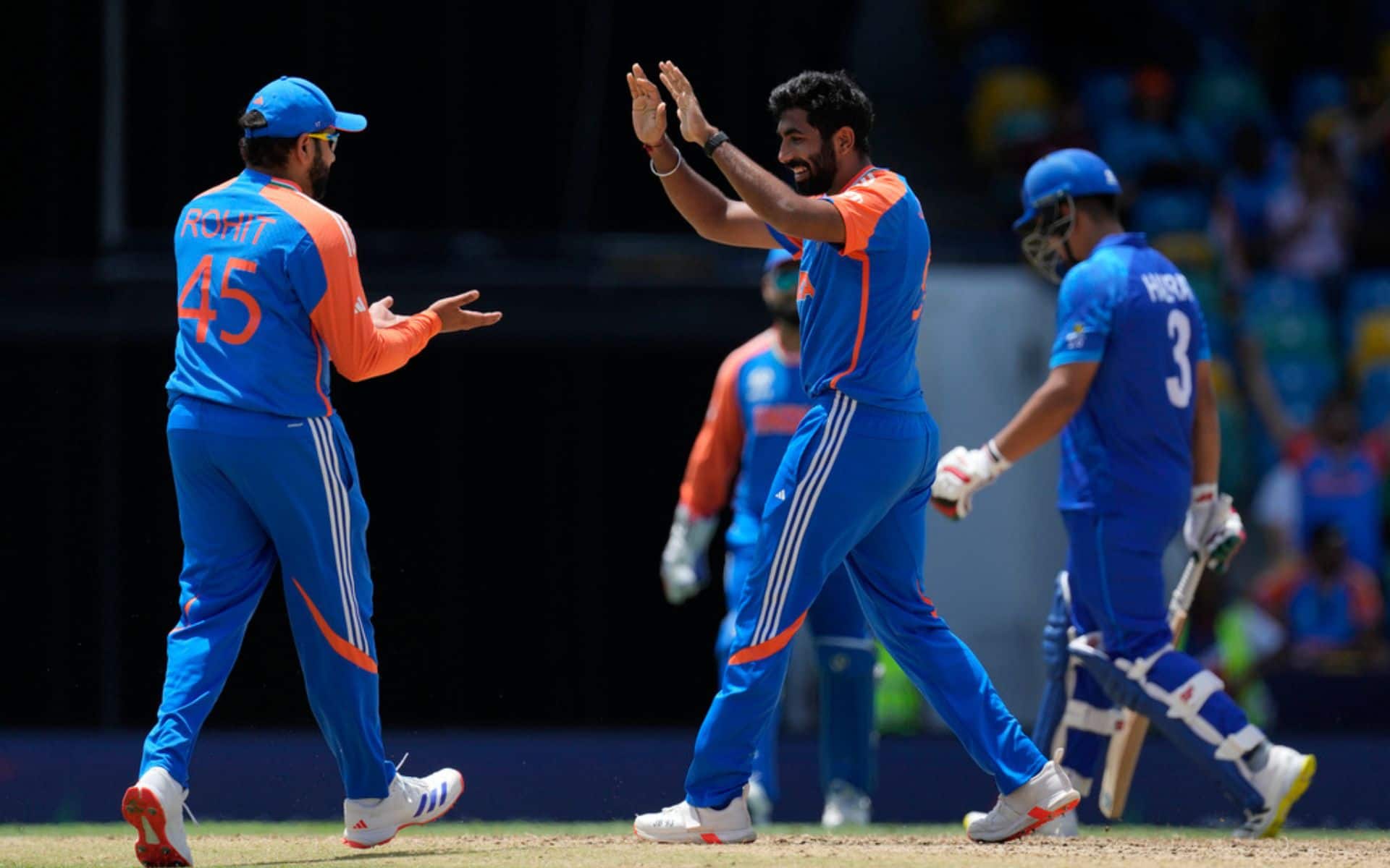 Rohit Sharma and Jasprit Bumrah during game vs AFG (AP Photos)