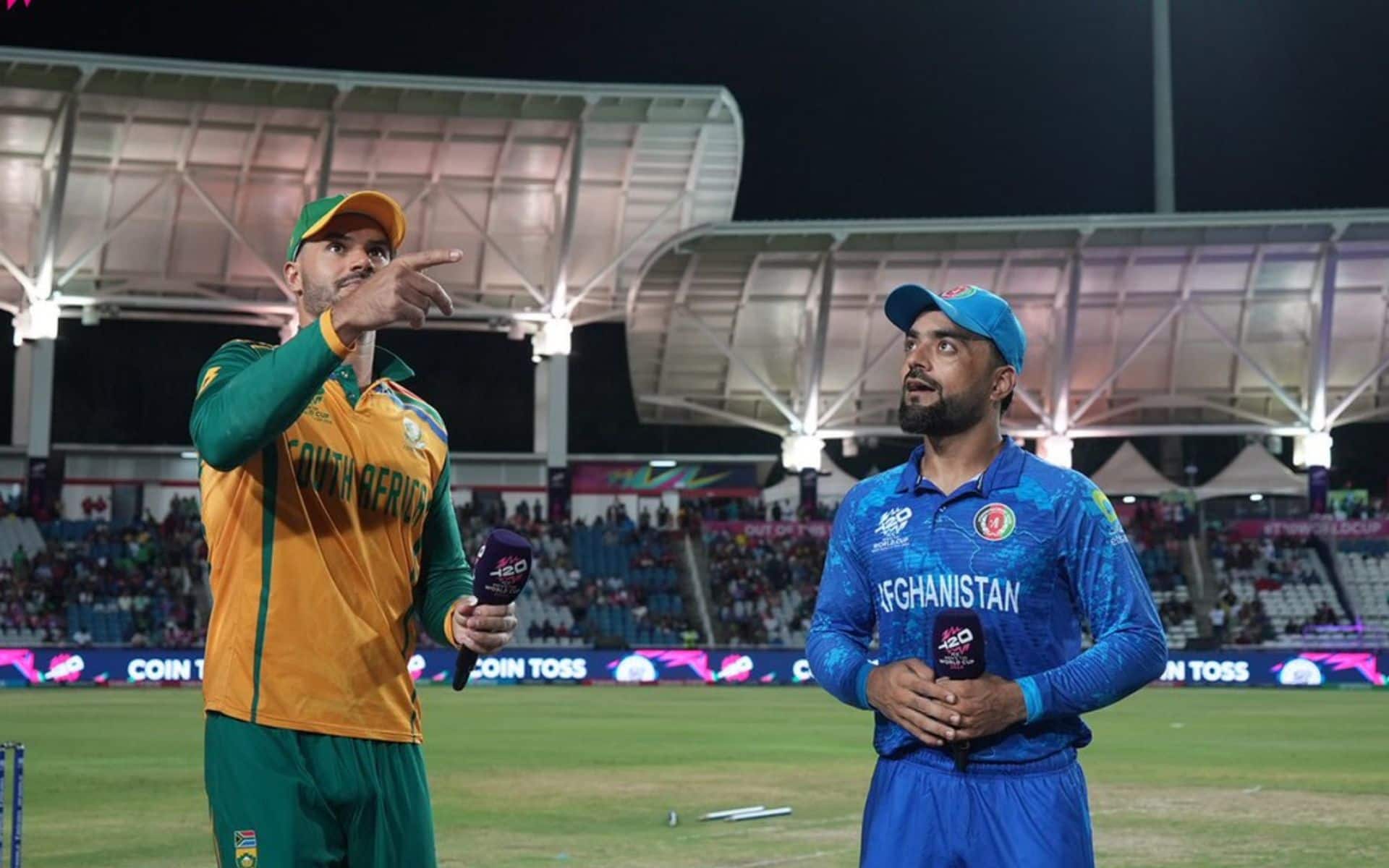 Aiden Markram and Rashid Khan during the toss in the 1st Semi-final of T20 WC 2024 [X]