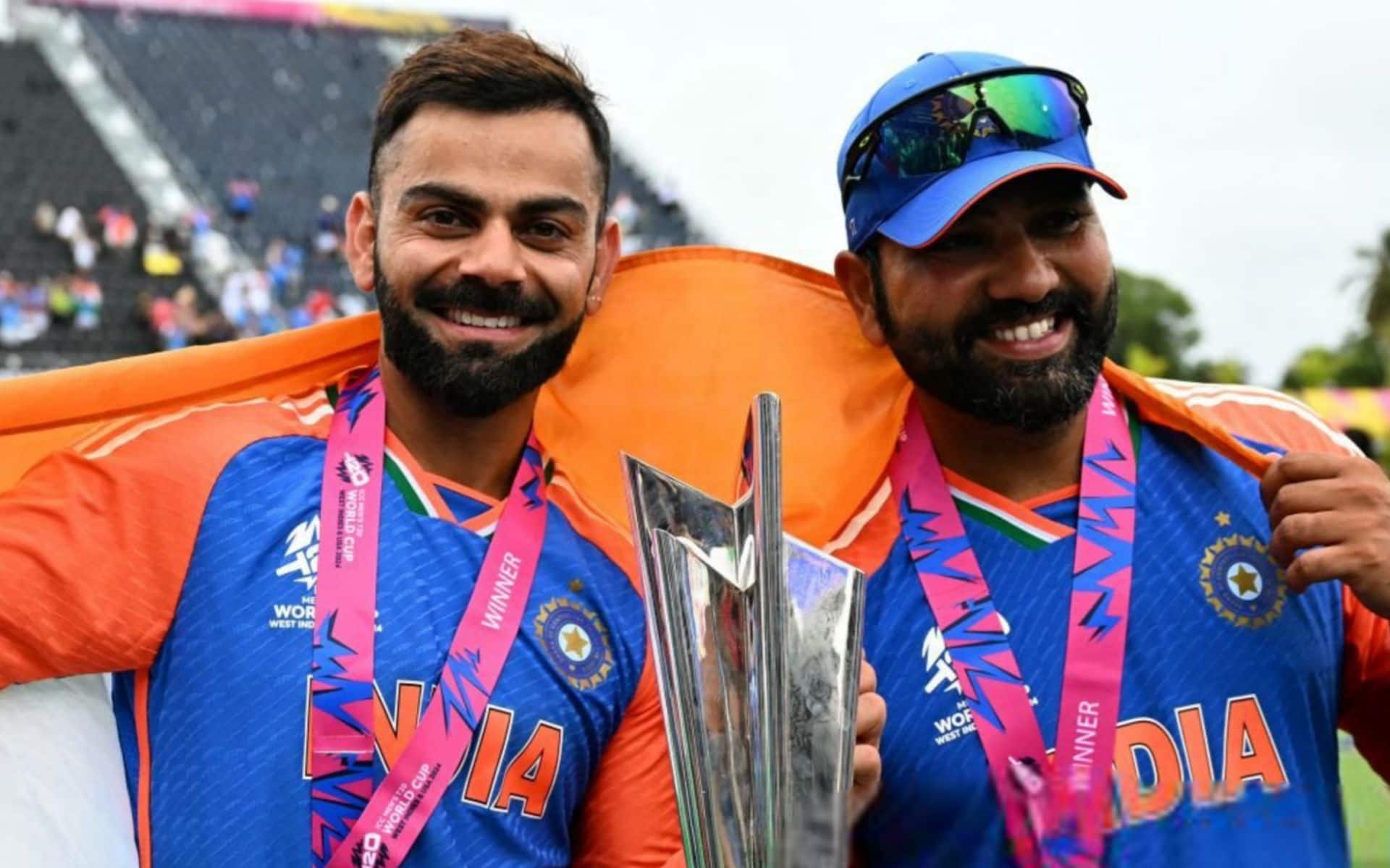Kohli and Rohit with the ICC T20 WC Trophy 2024 (AP)