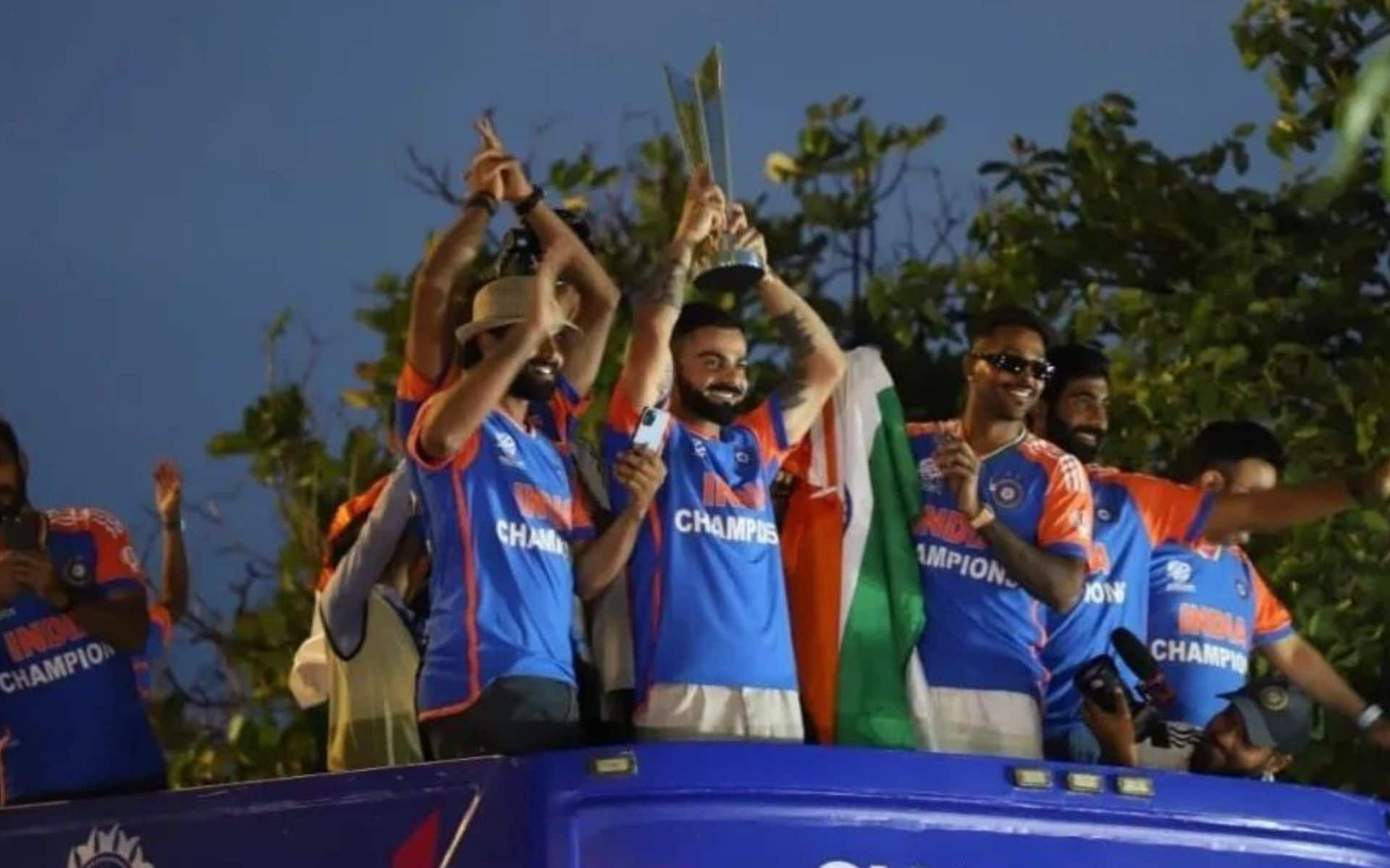 Virat Kohli Lifting Trophy - (X.com)