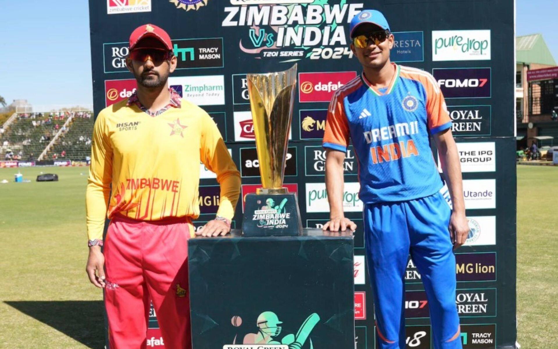 Sikandar Raza and Shubman Gill with the T20I series trophy (x.com)