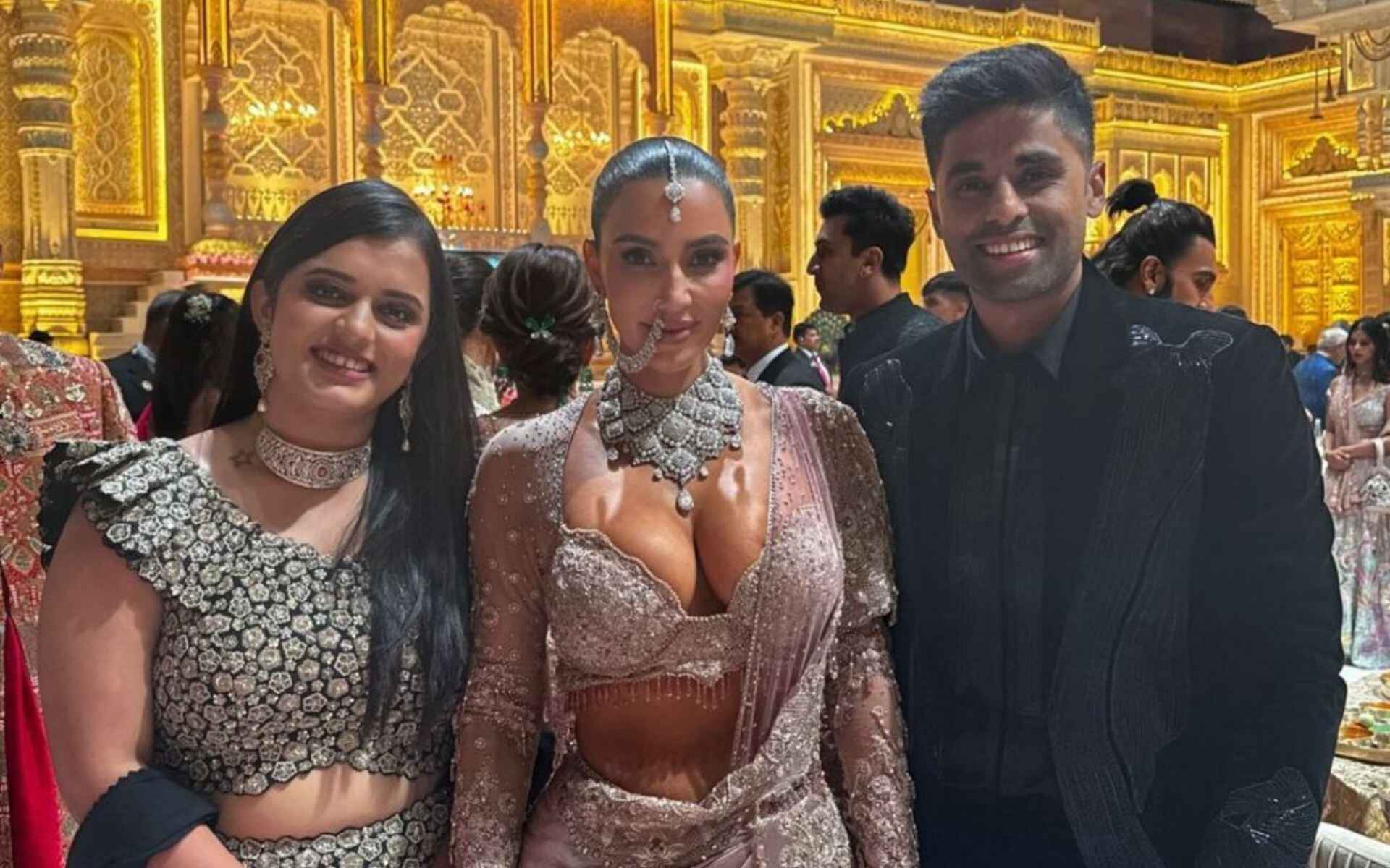 Suryakumar Yadav with wife Devisha Shetty and Kim Kardashian at the grand wedding (x)