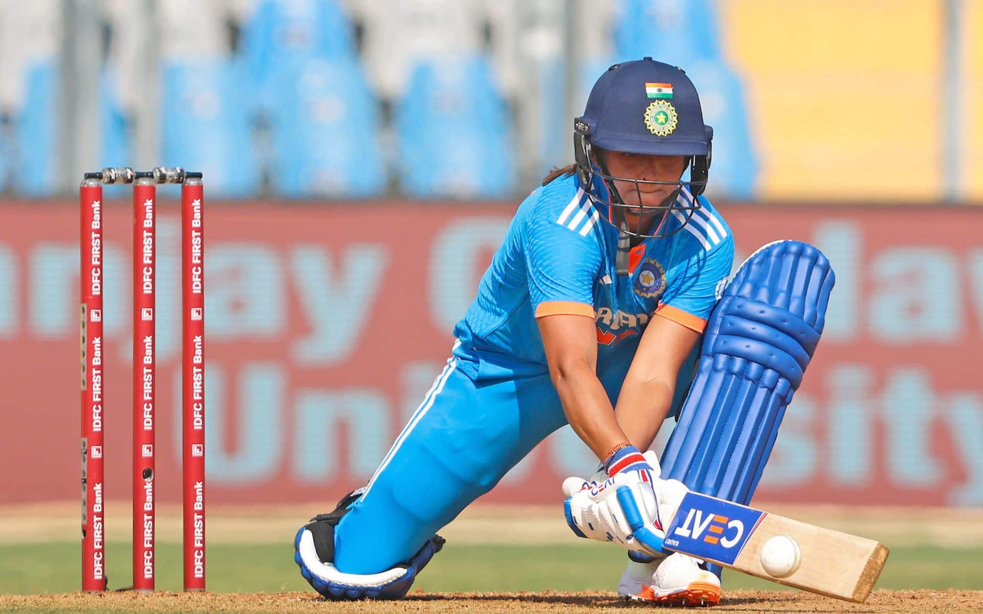 Harmanpreet Kaur playing a reverse sweep in Indian colours [X]