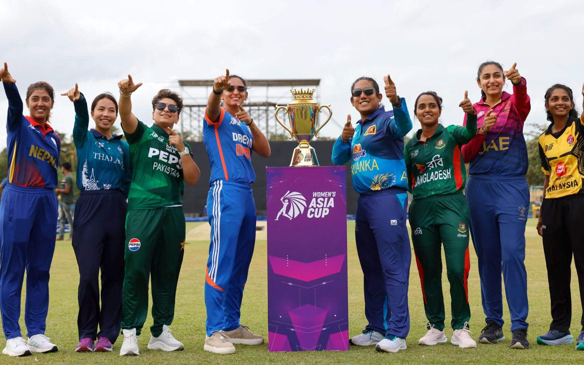 The Captains of the Women's Asia Cup teams with the trophy [X]