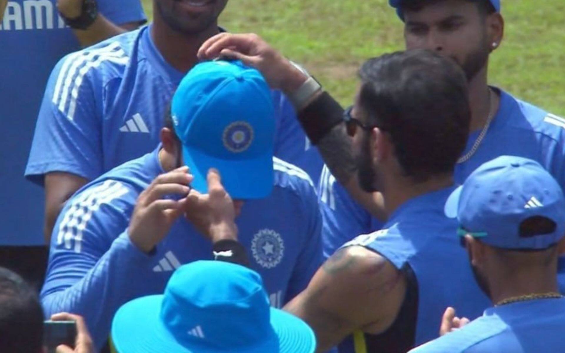 Kohli presents a cap to Parag (X.com)