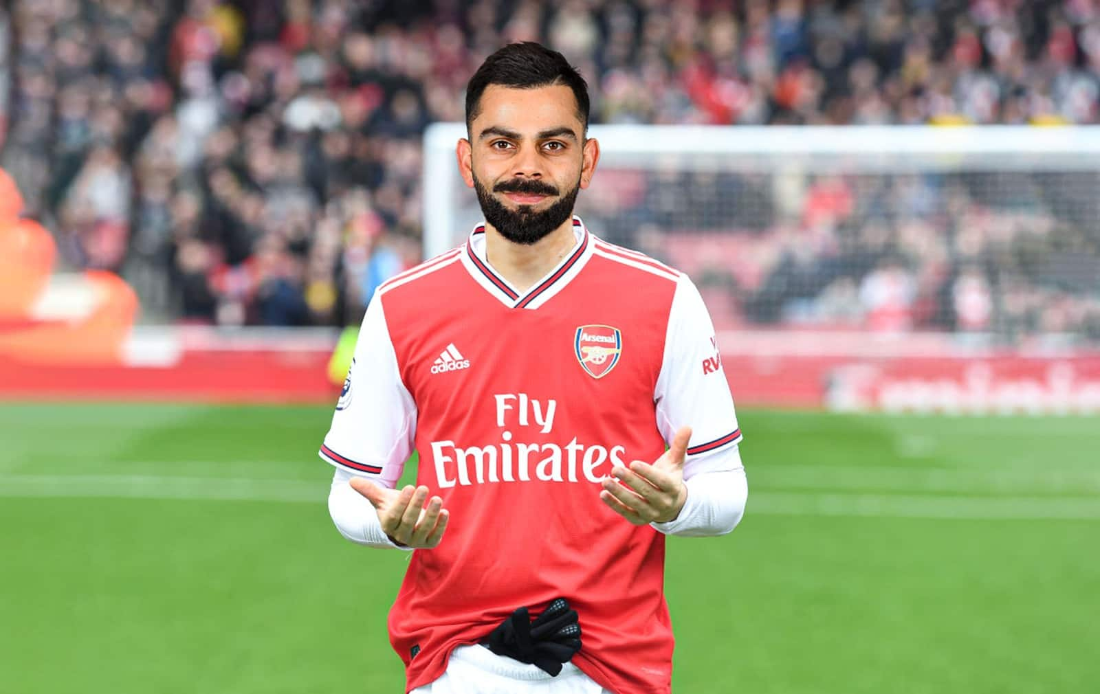 Kohli in an Arsenel Jersey [X]
