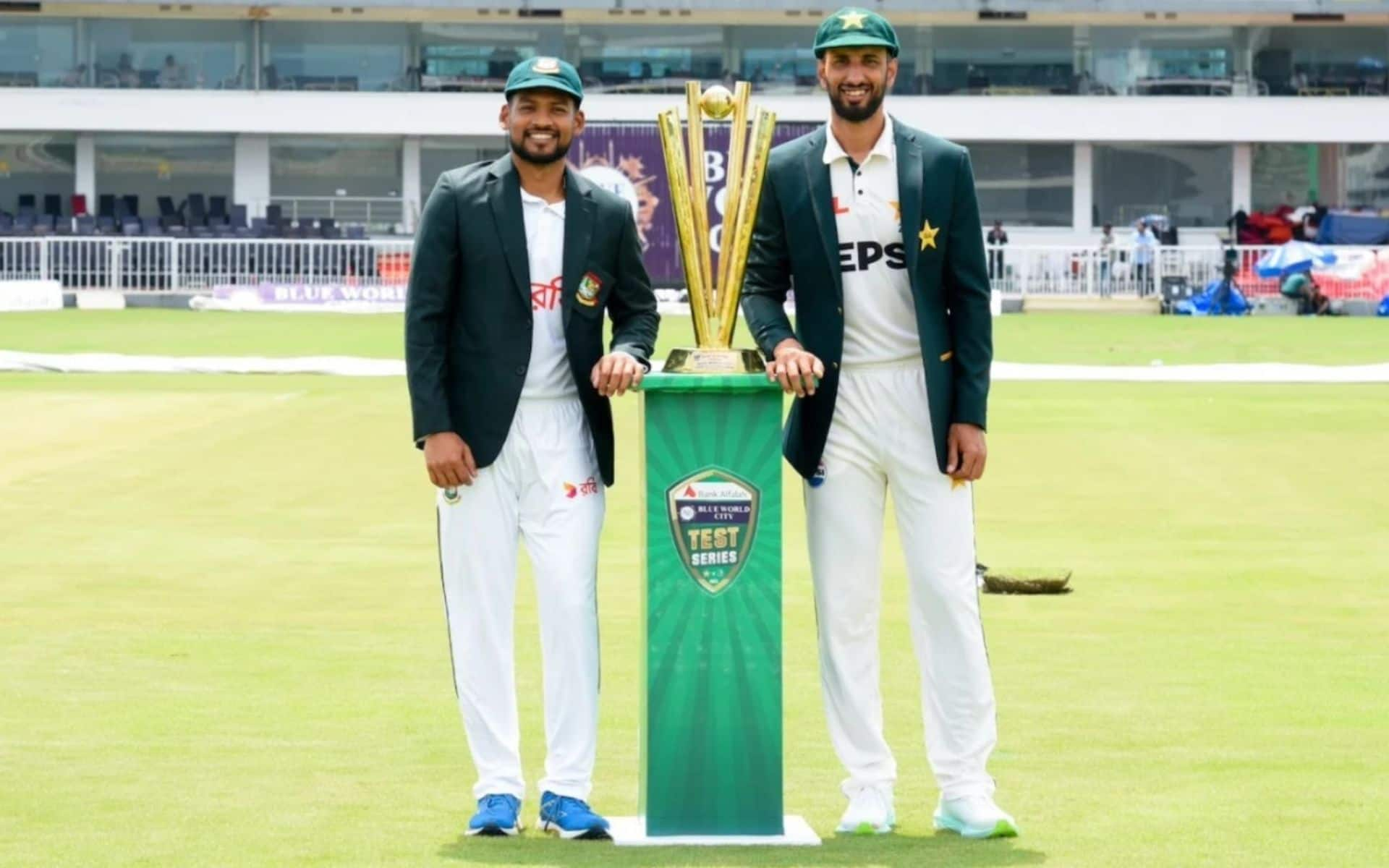 Najmul Hossain Shanto and Shan Masood with the series trophy (PCB)