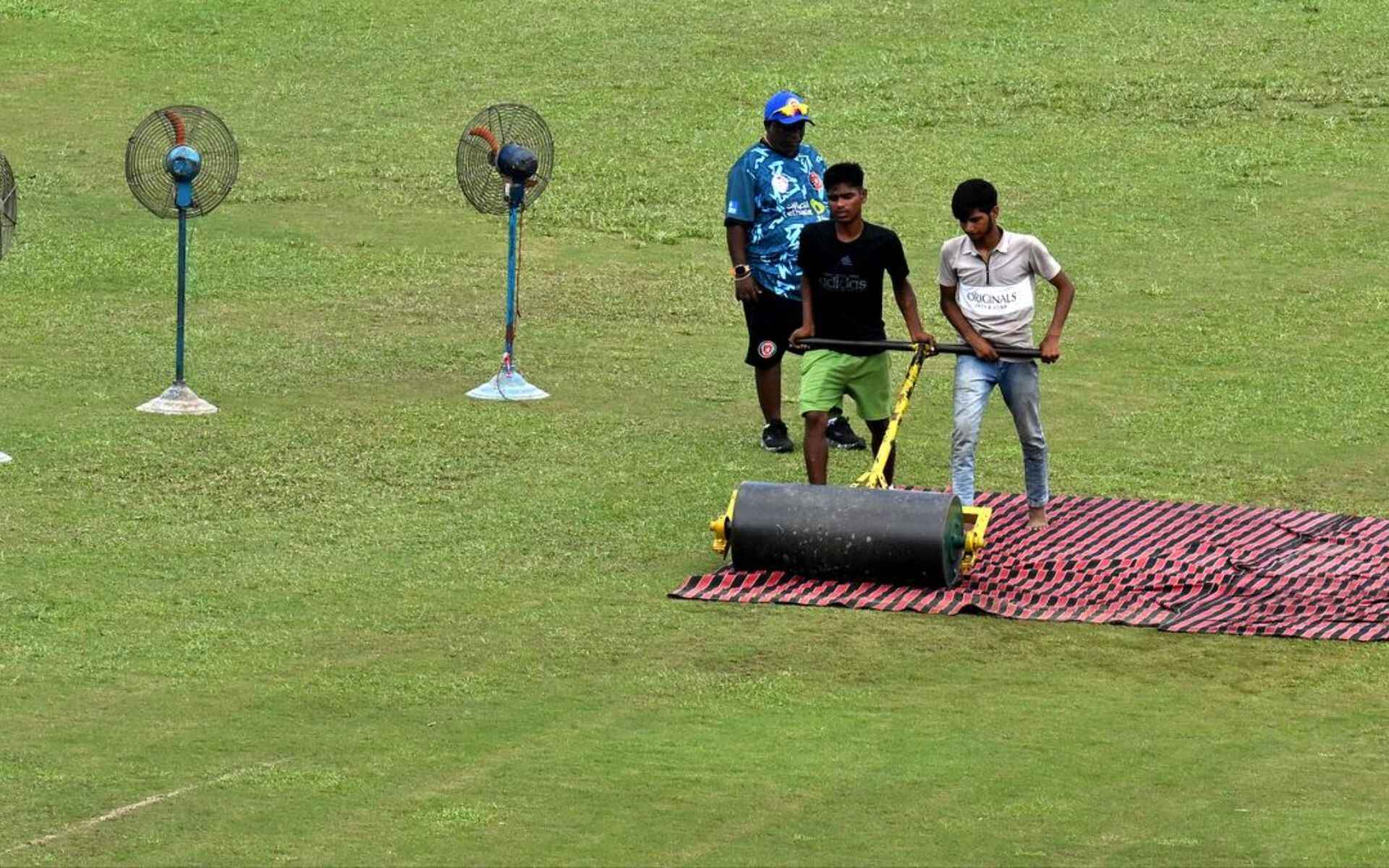 Fans being used to dry the wet ground (X)