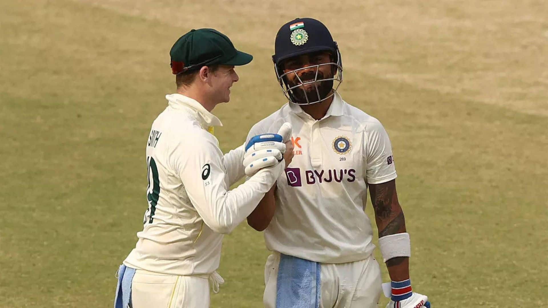 Virat Kohli with Steve Smith [X]