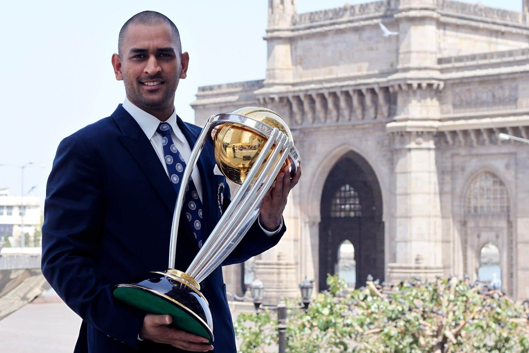 MS Dhoni with the World Cup trophy [ICC]
