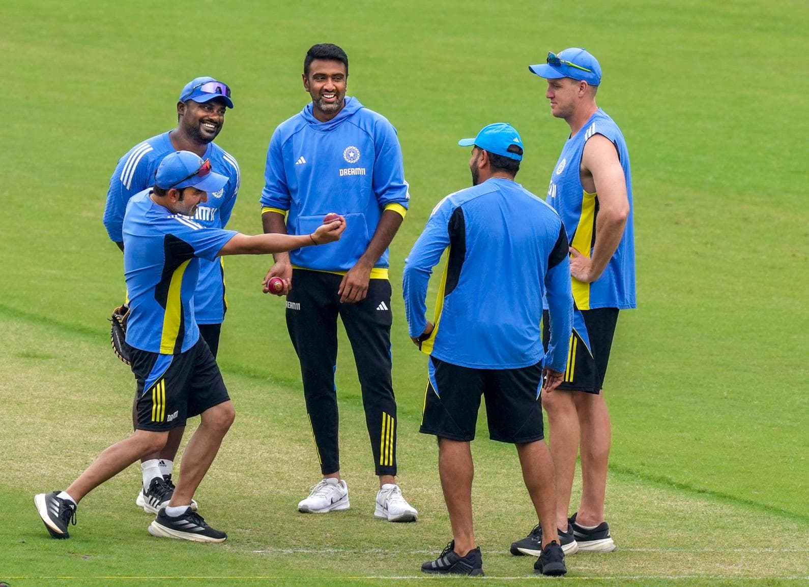 Rohit Sharma and coaching staff with Ashwin [Source: PTI]
