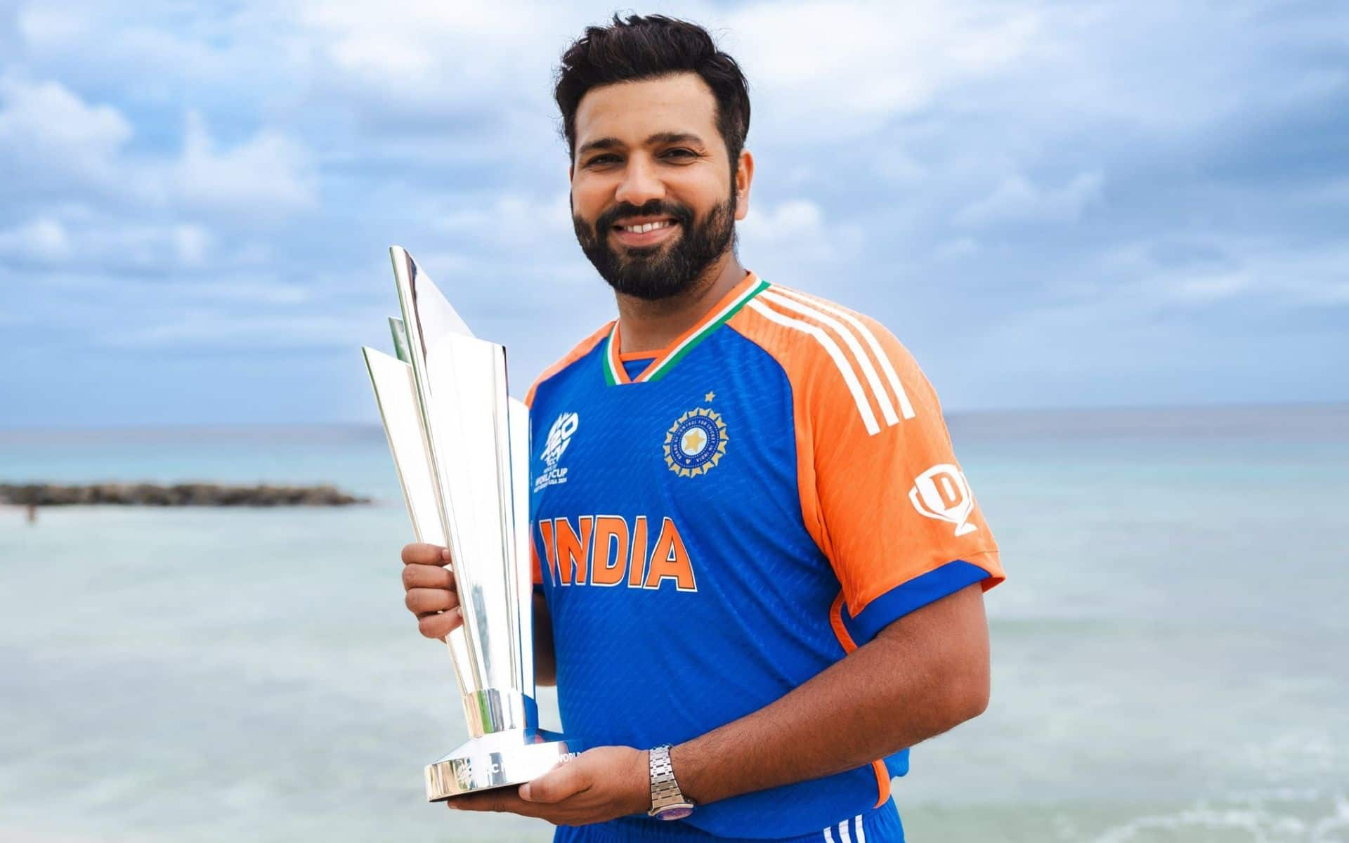 Rohit Sharma with the T20 World Cup Trophy (Source: @ImTanujSingh/x.com)