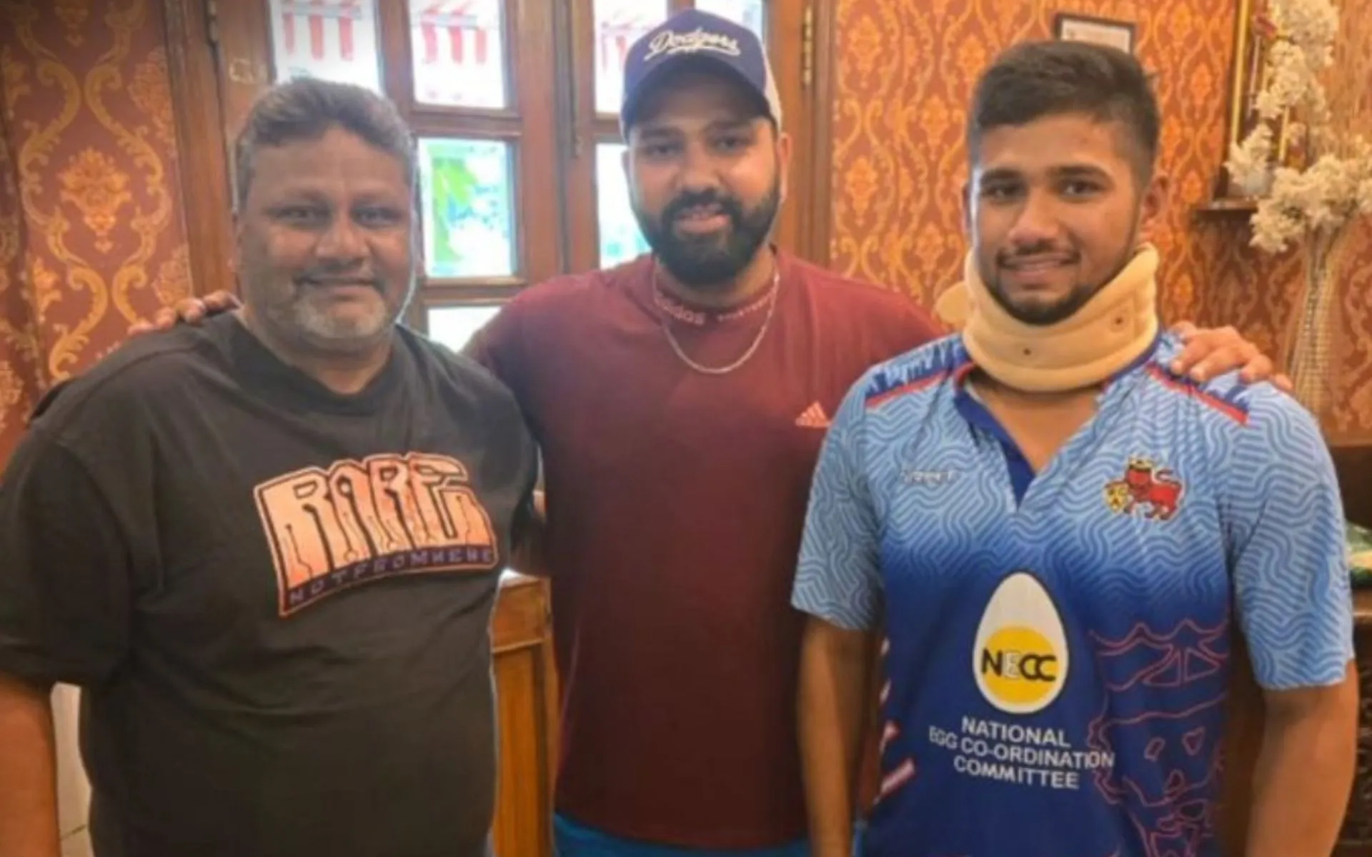 Rohit Sharma uplifts injured Musheer Khan's spirits (@OneCricketApp/X.com)