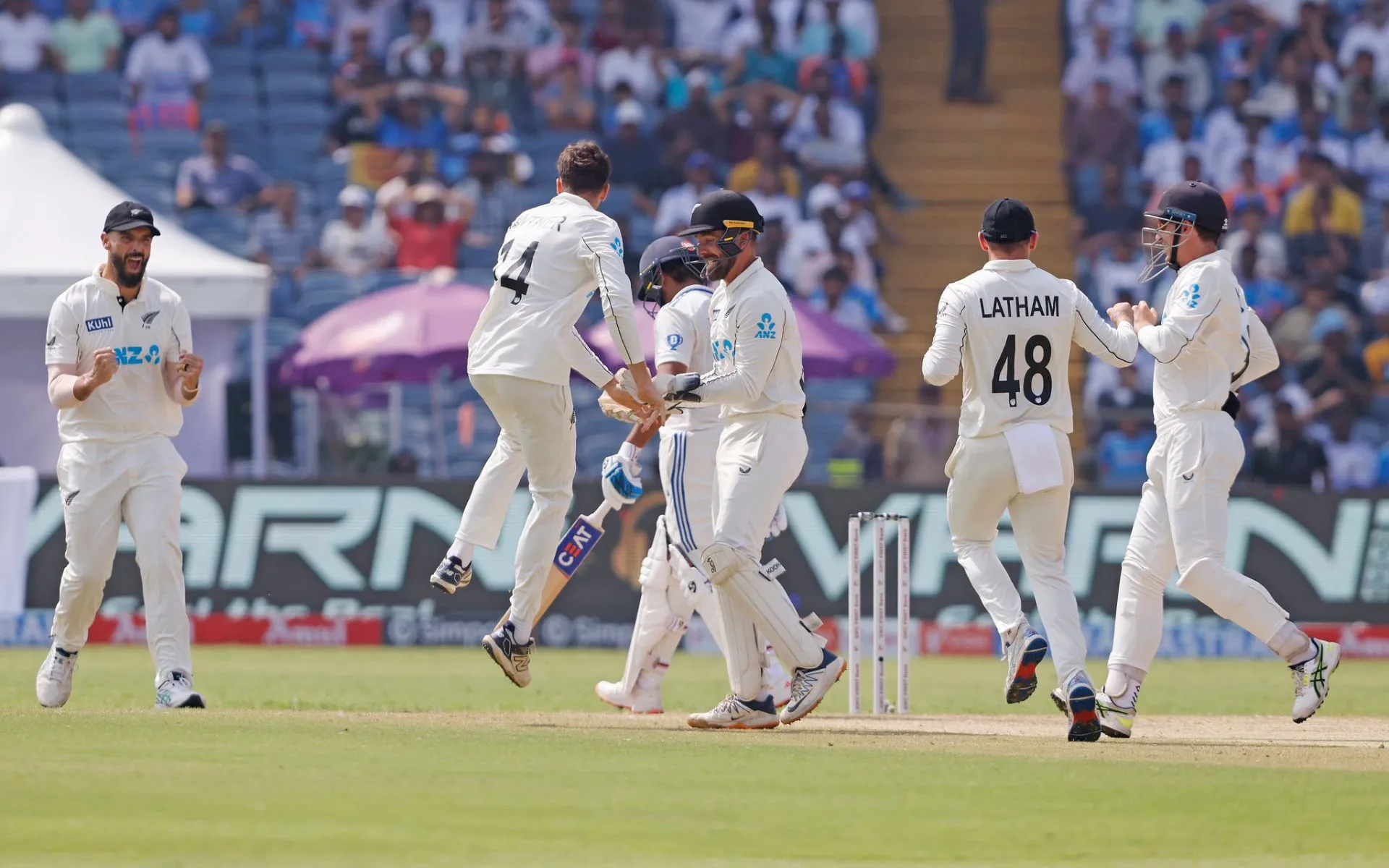 New Zealand players celebrating an Indian wicket [Source: @BLACKCAPS/x]