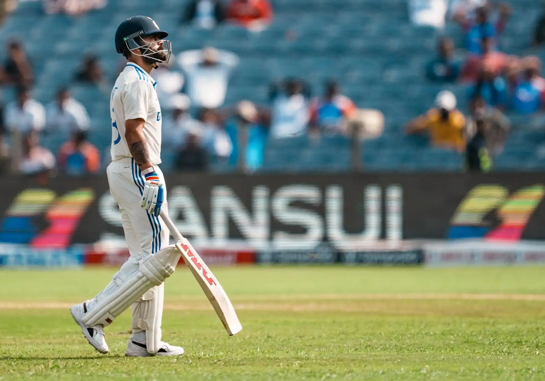 Kohli walking back after getting dismissed [Source: PTI]
