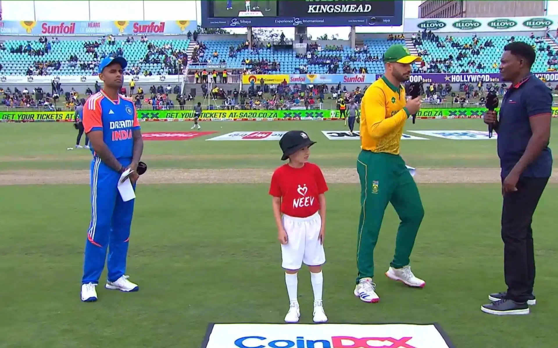 Suryakumar Yadav and Aiden Markram during the toss in the first T20I [Source: @CricWatcher11/x.com]