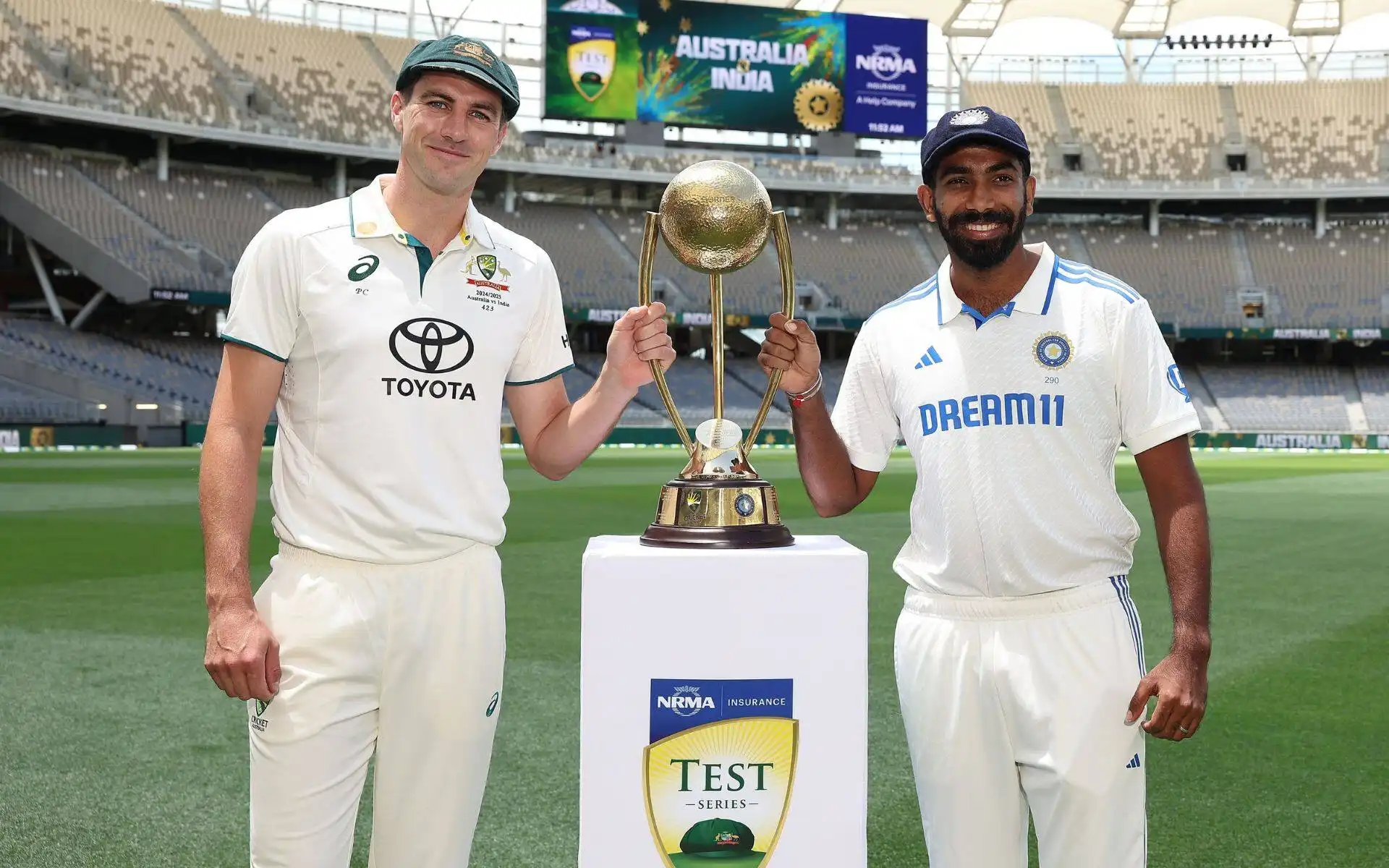 Pat Cummins and Jasprit Bumrah with the Border-Gavaskar Trophy [Source: @cricketcomau/x.com]